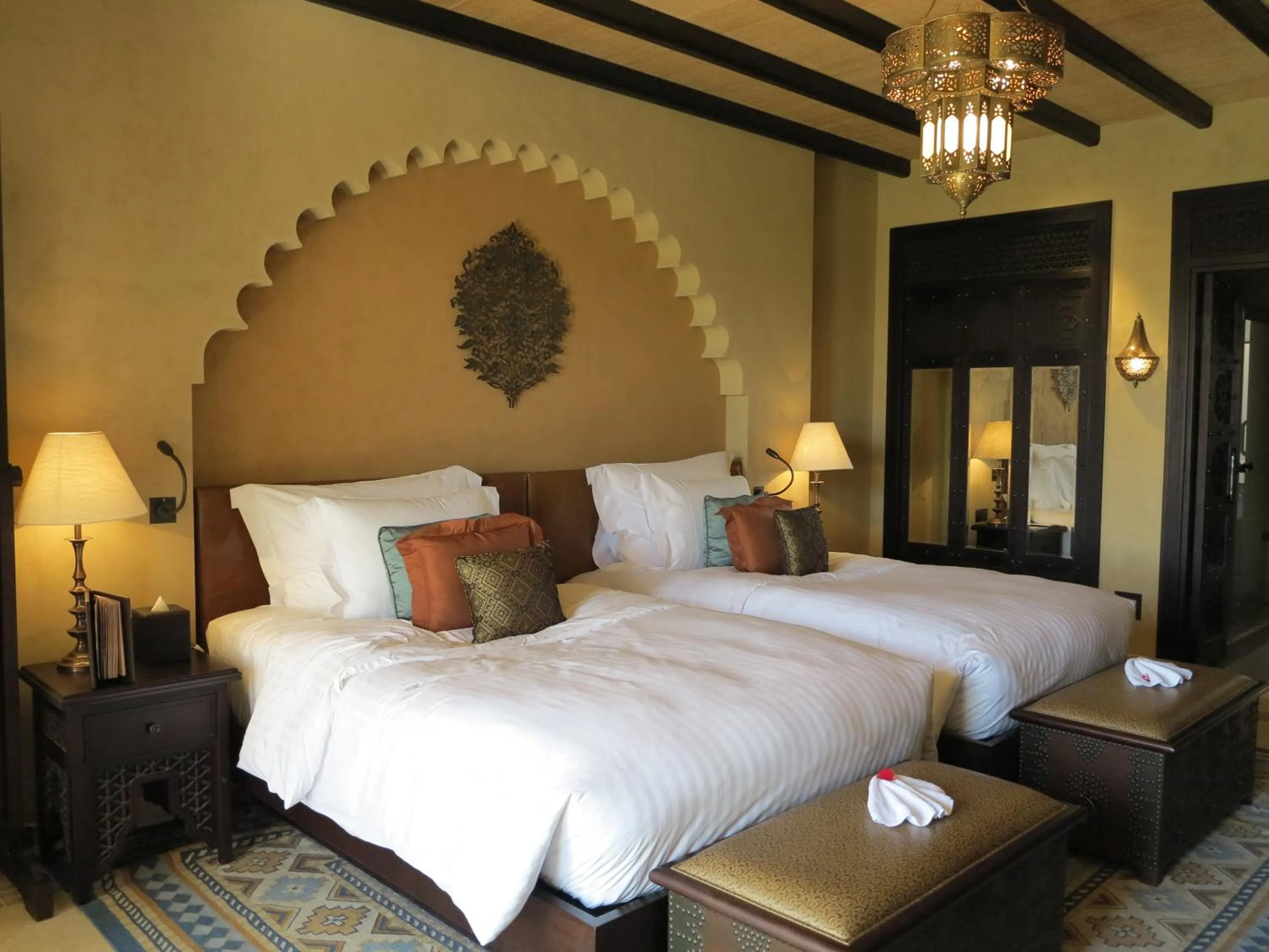 Bed in Anantara Qasr al Sarab Desert Resort