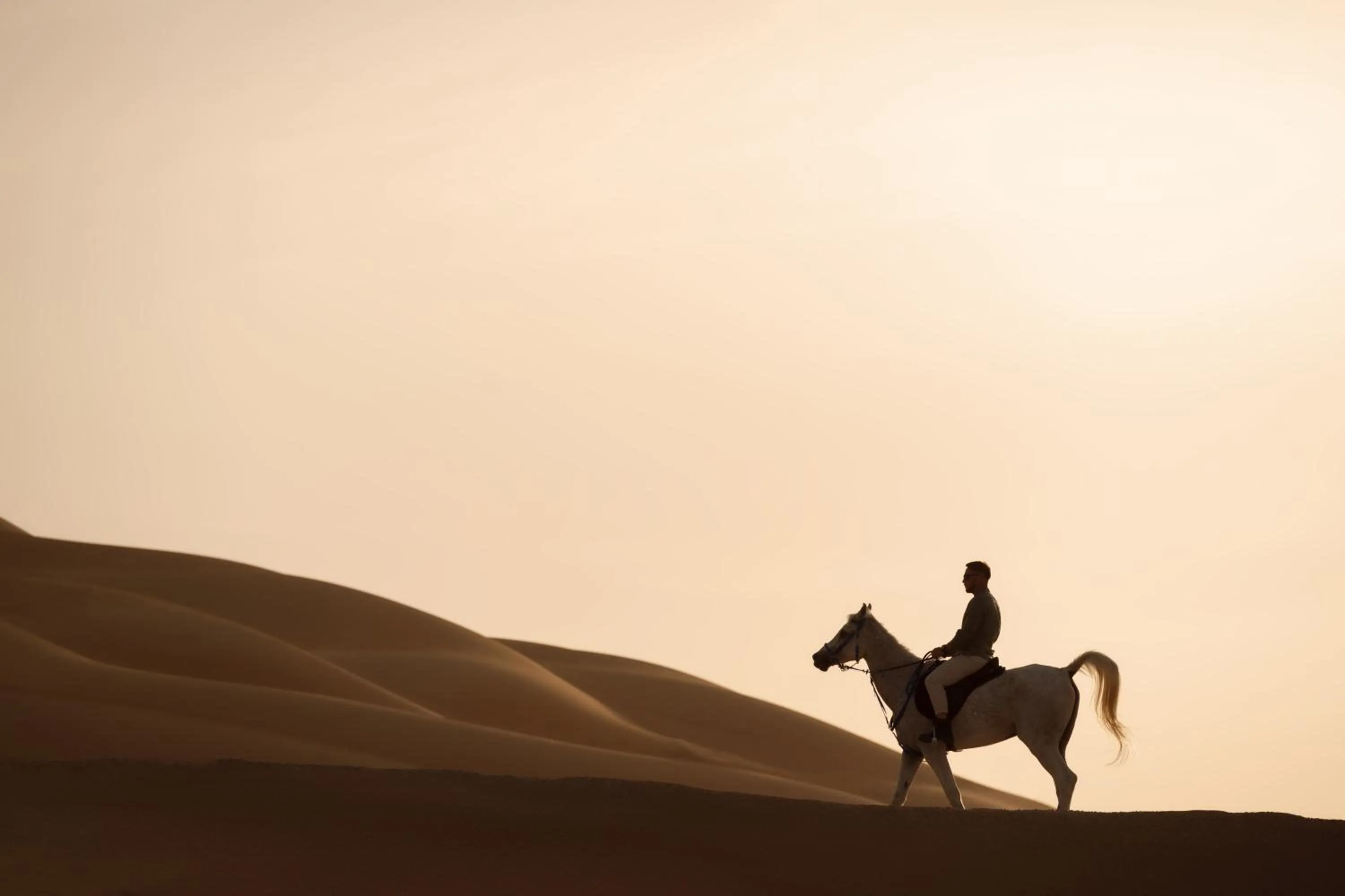 Horse-riding in Anantara Qasr al Sarab Desert Resort