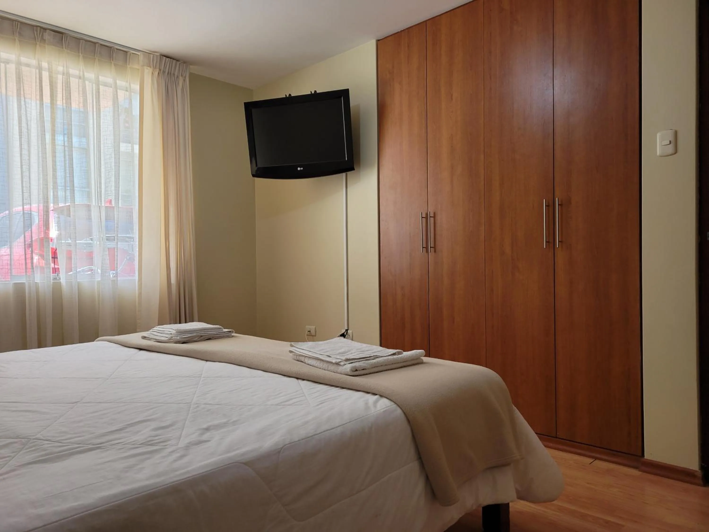 Bedroom, Bed in Departamento Los Balcones
