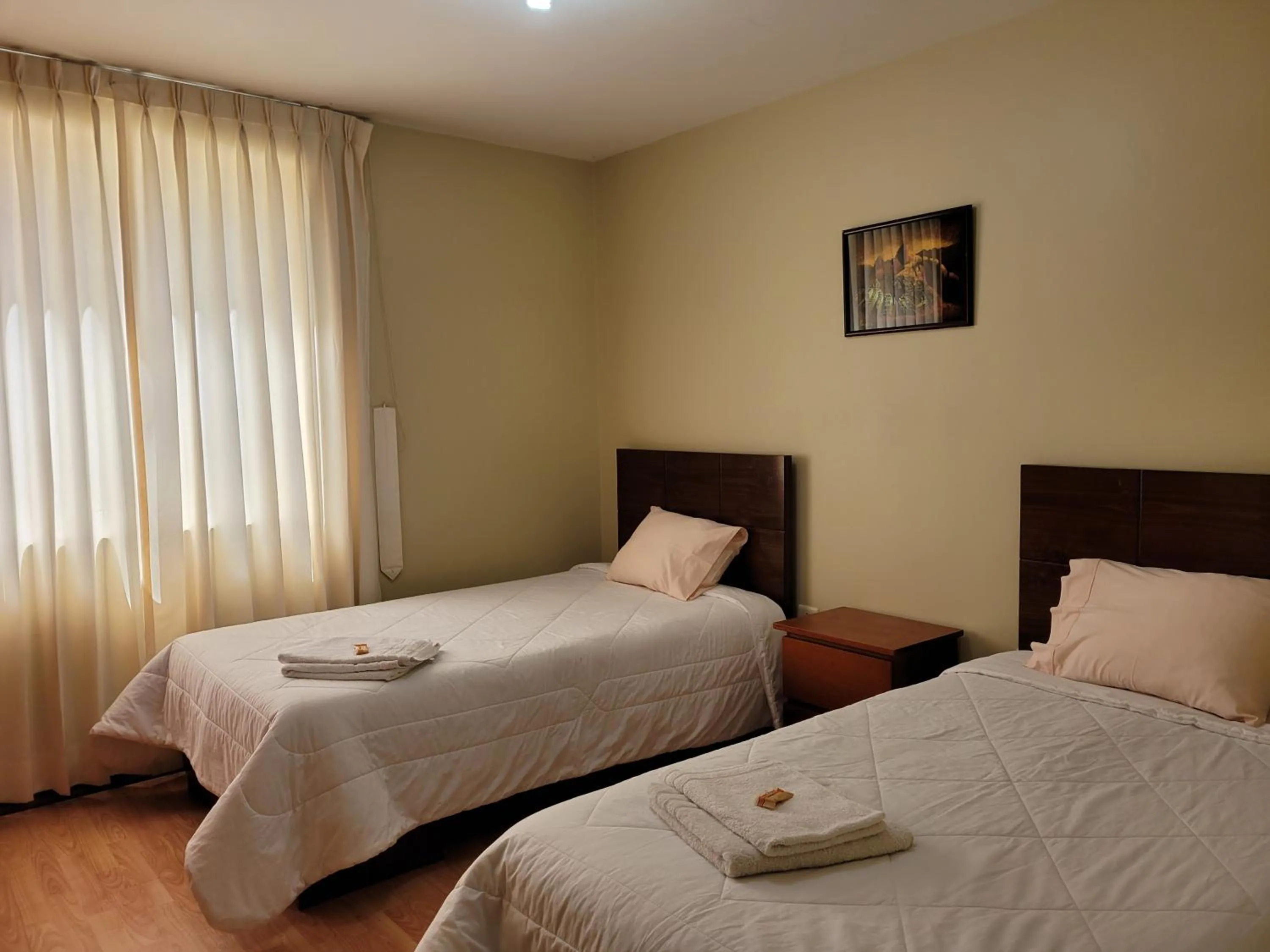 Bedroom, Bed in Departamento Los Balcones