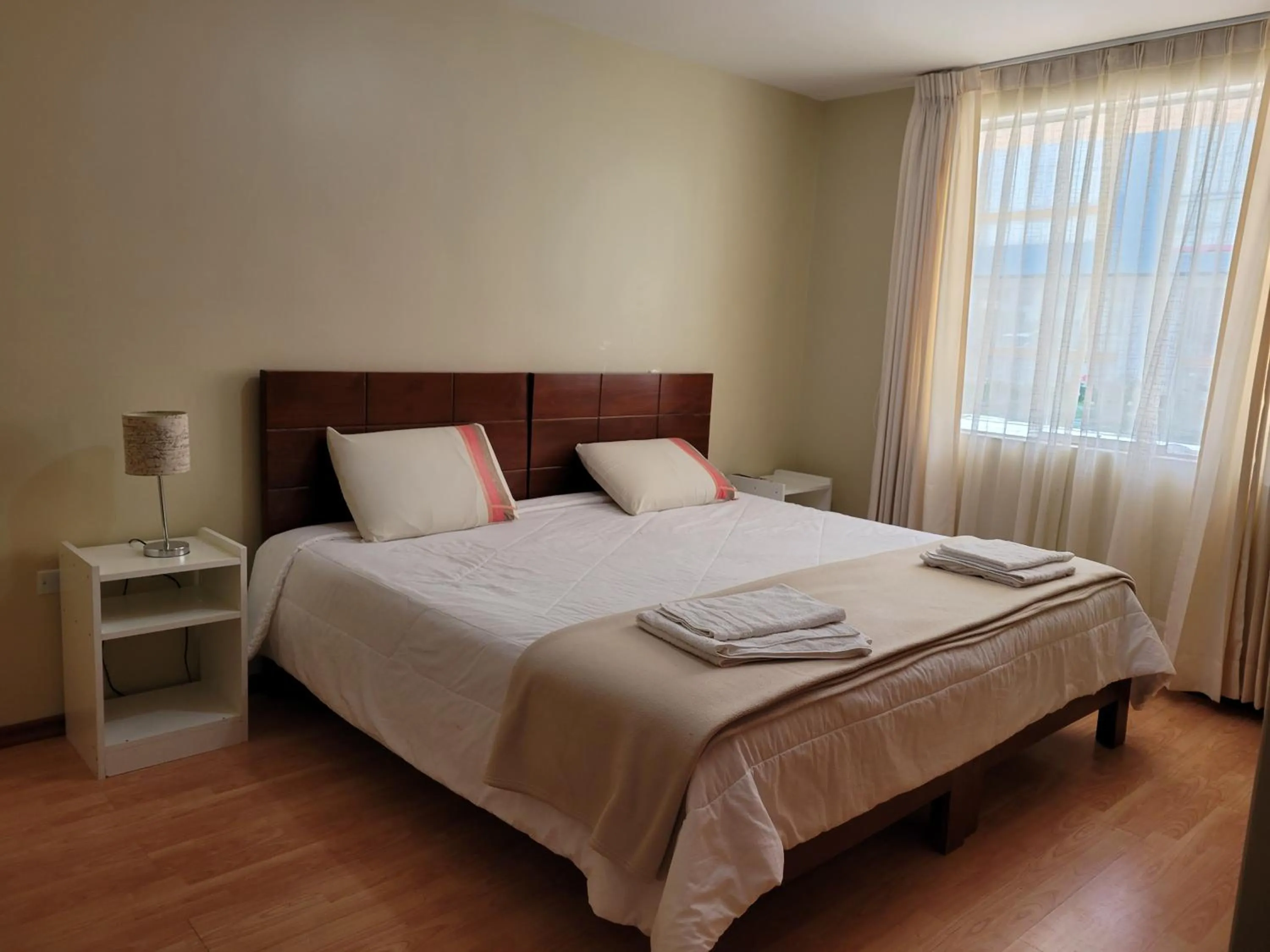 Bedroom, Bed in Departamento Los Balcones