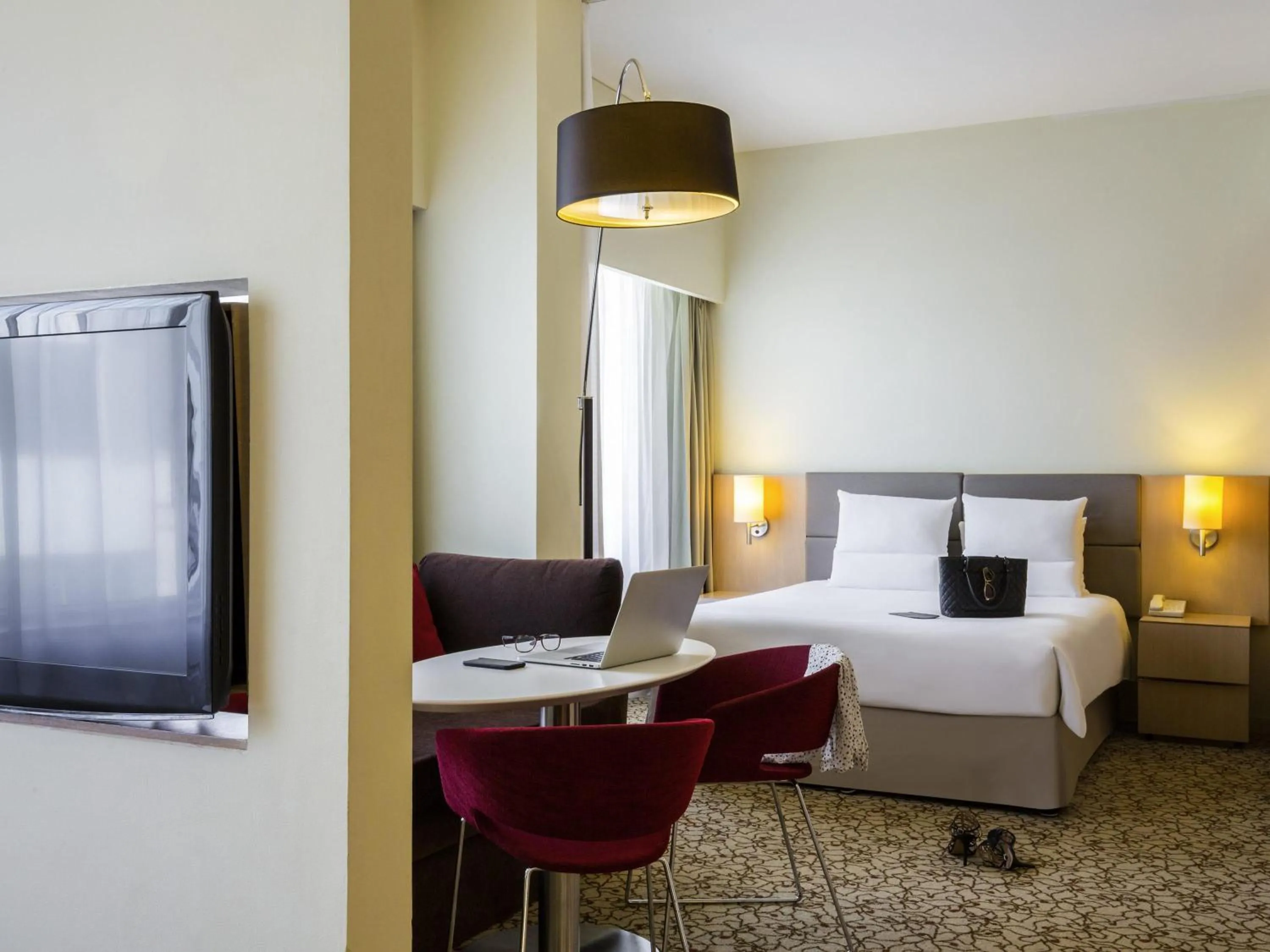 Bedroom, Bed in Novotel Suites Mall Avenue Dubai