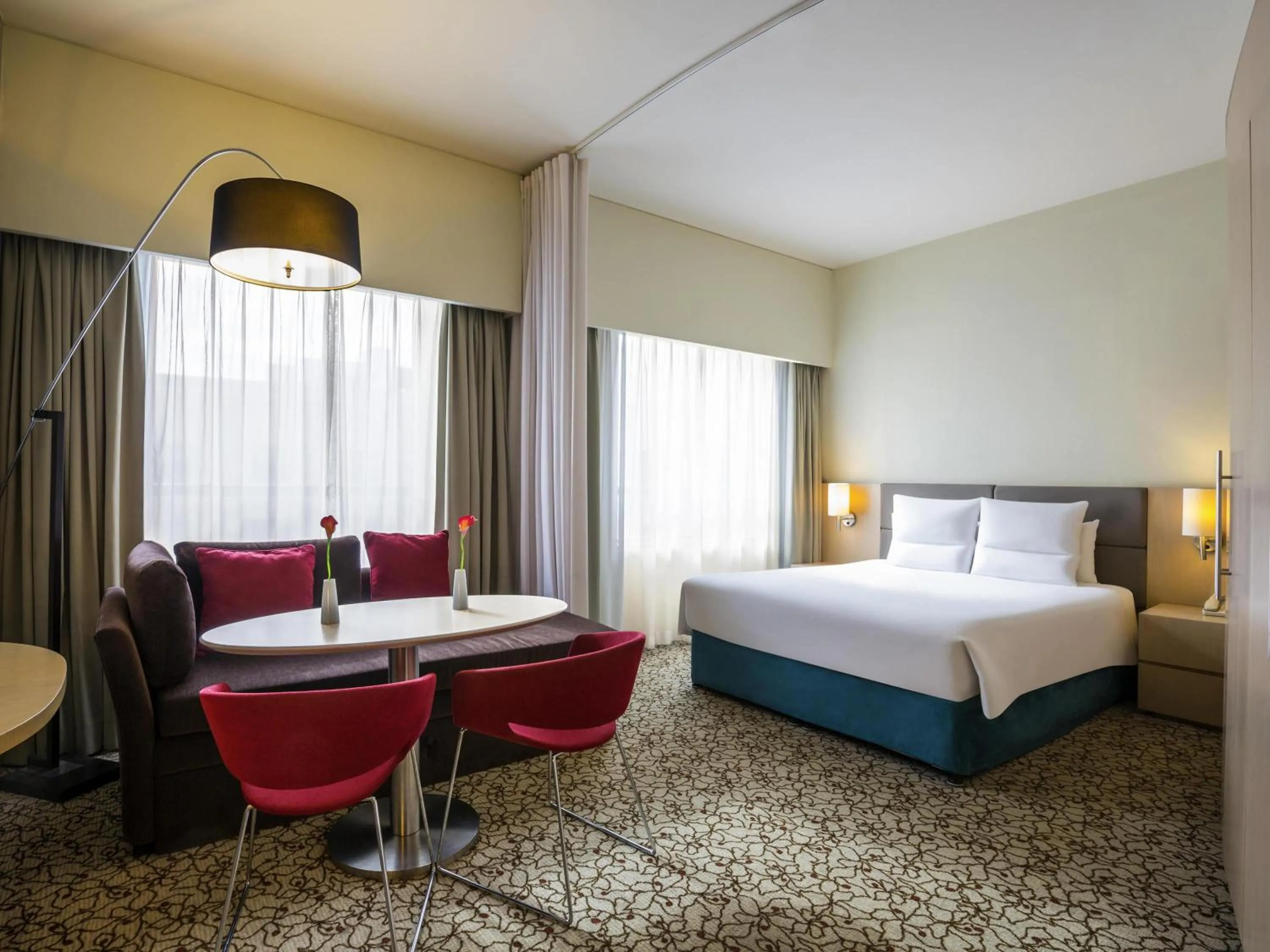 Bedroom, Bed in Novotel Suites Mall Avenue Dubai