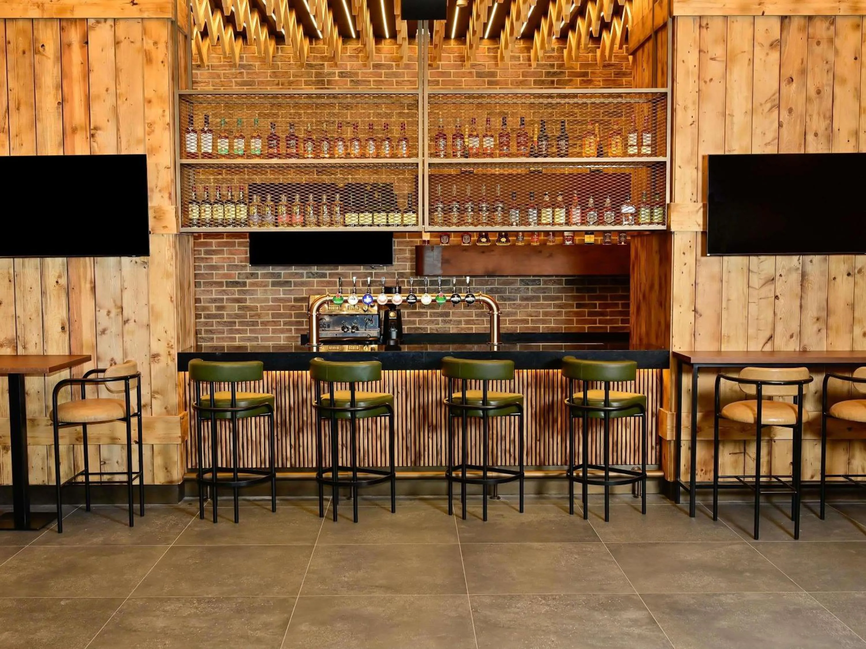 Lounge or bar in Novotel Suites Mall Avenue Dubai