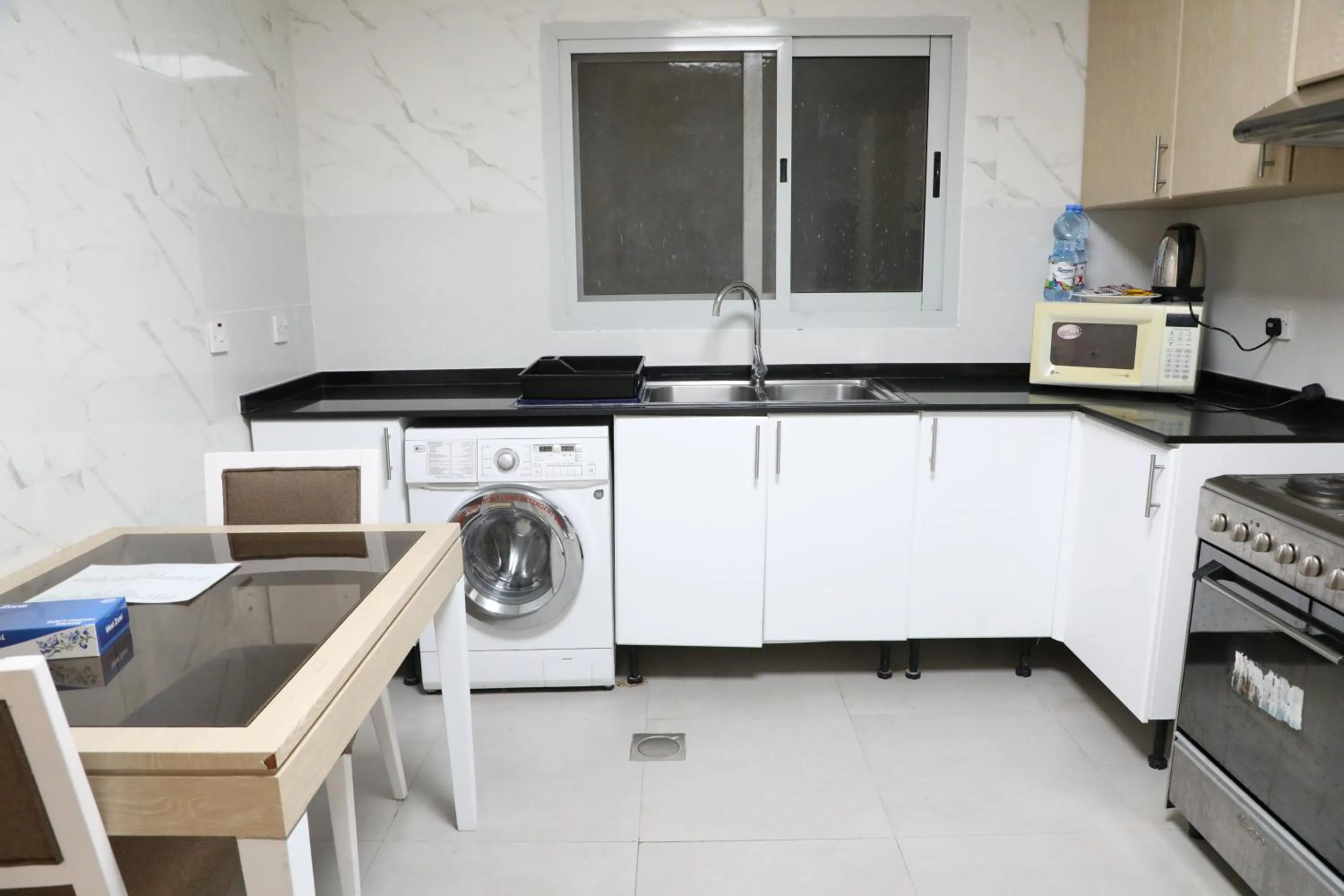 Kitchen or kitchenette in Wescott Plaza Hotel Apartments LLC Formerly West Zone Plaza Hotel Apts