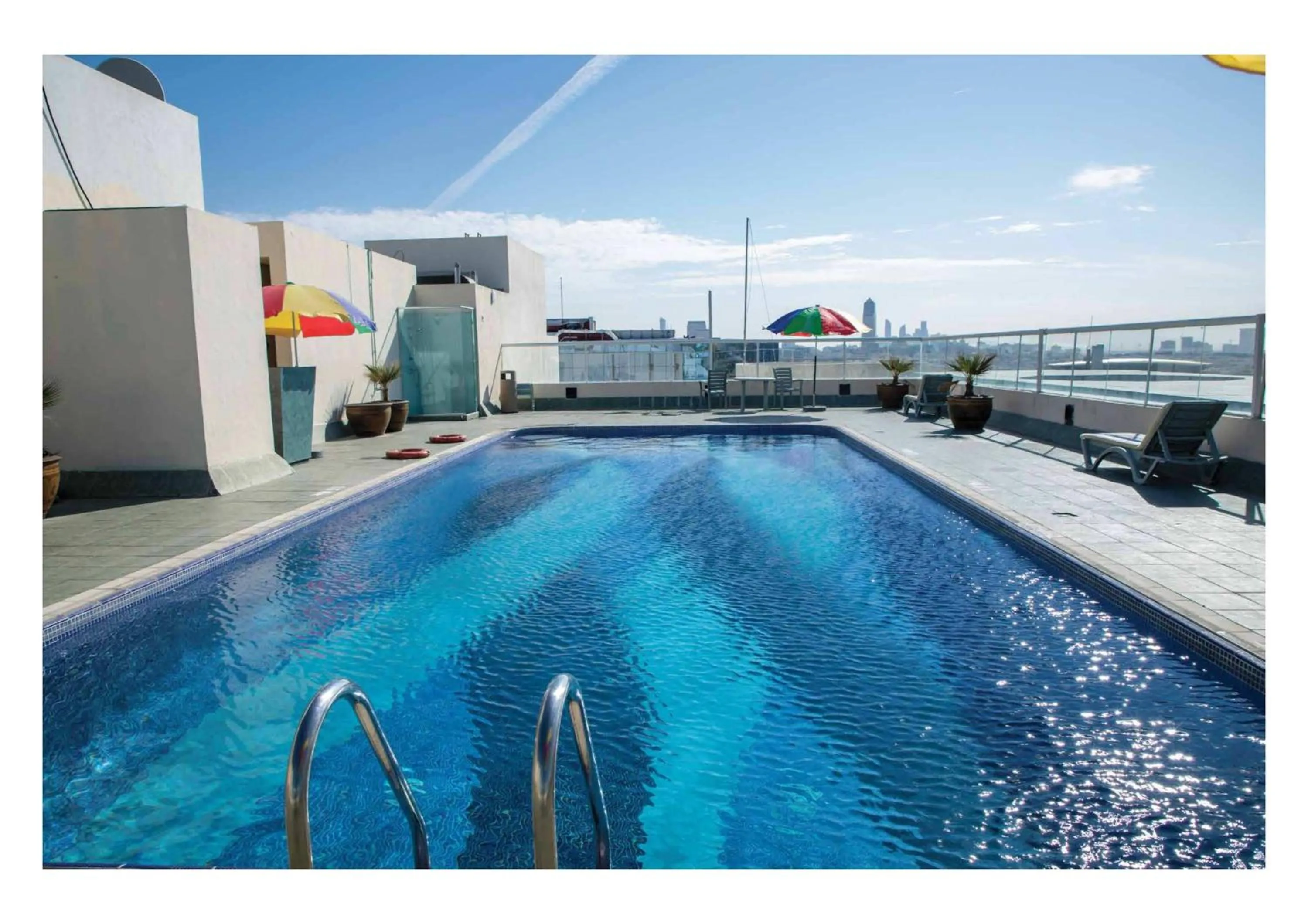 Swimming pool in Wescott Plaza Hotel Apartments LLC Formerly West Zone Plaza Hotel Apts