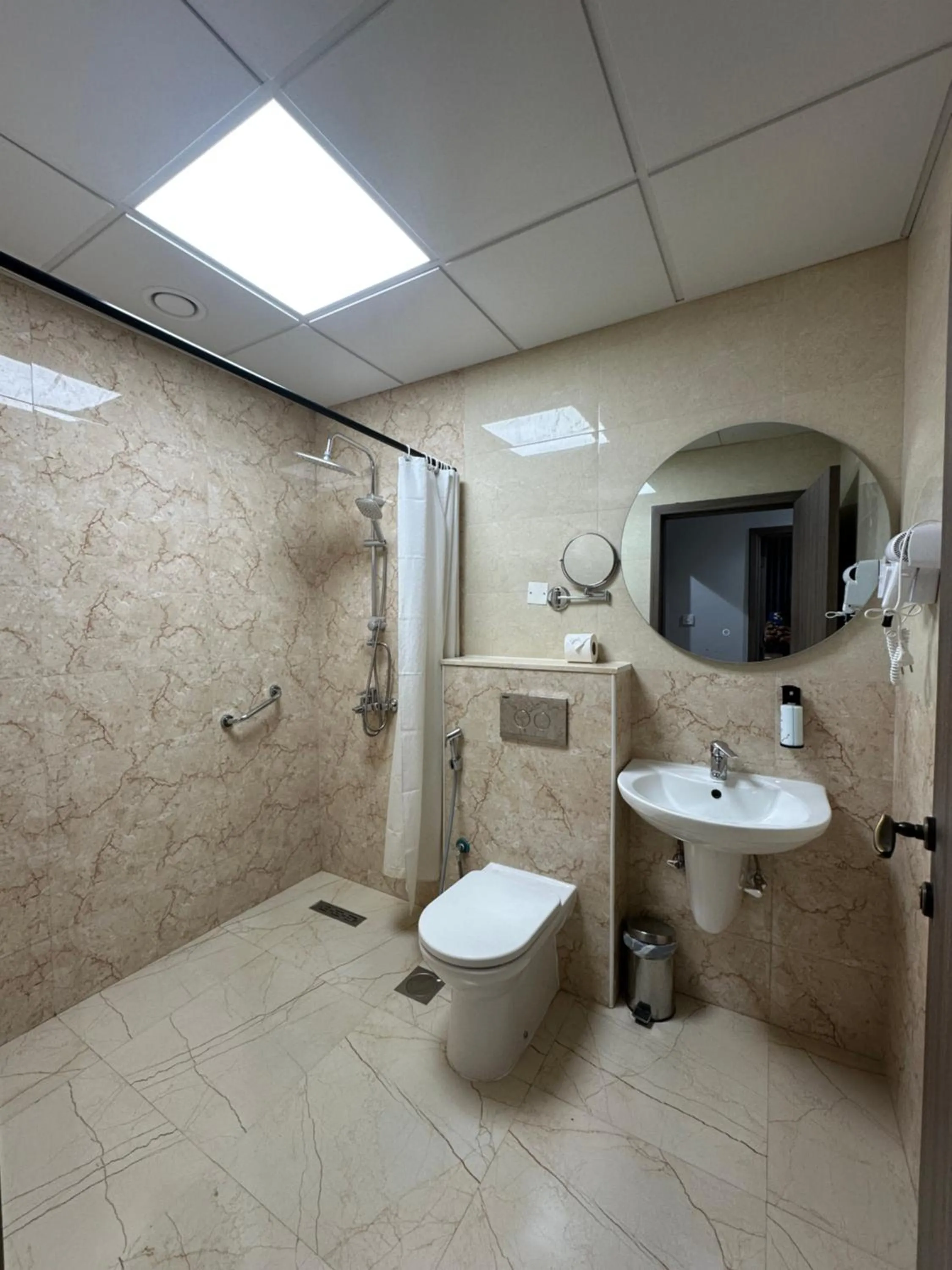 Shower in Wescott Plaza Hotel Apartments LLC Formerly West Zone Plaza Hotel Apts