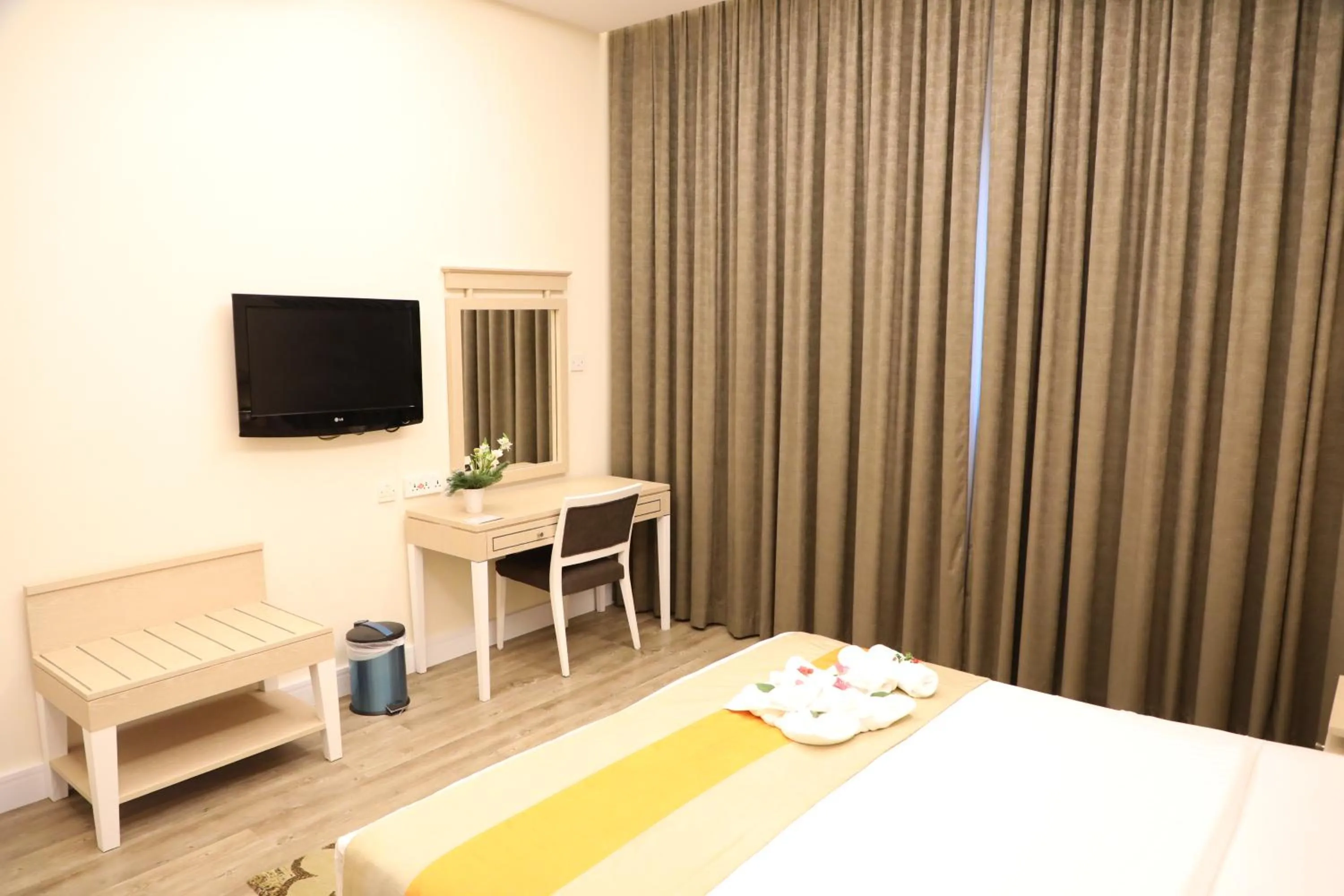 Bed in Wescott Plaza Hotel Apartments LLC Formerly West Zone Plaza Hotel Apts