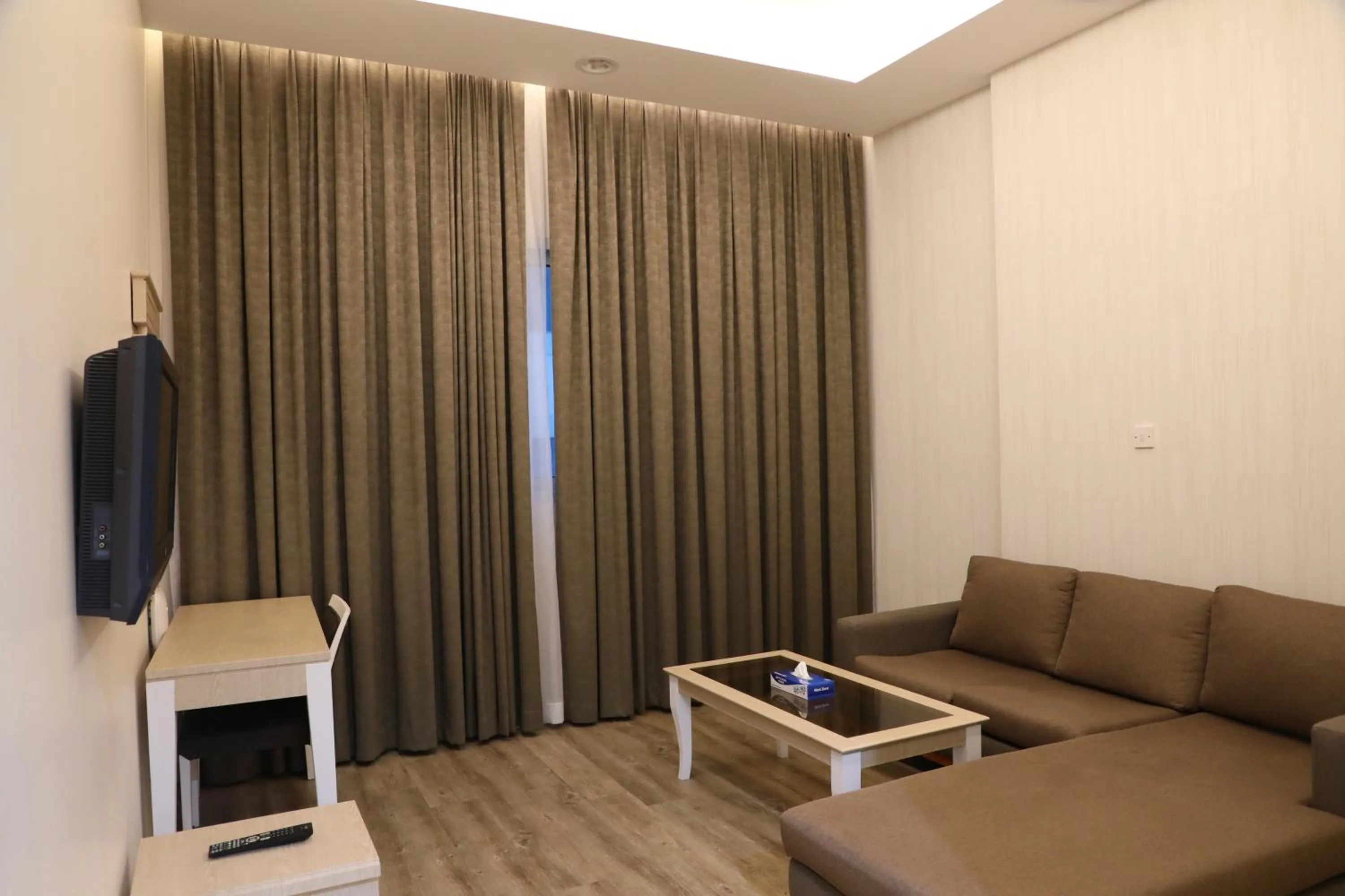 TV and multimedia in Wescott Plaza Hotel Apartments LLC Formerly West Zone Plaza Hotel Apts