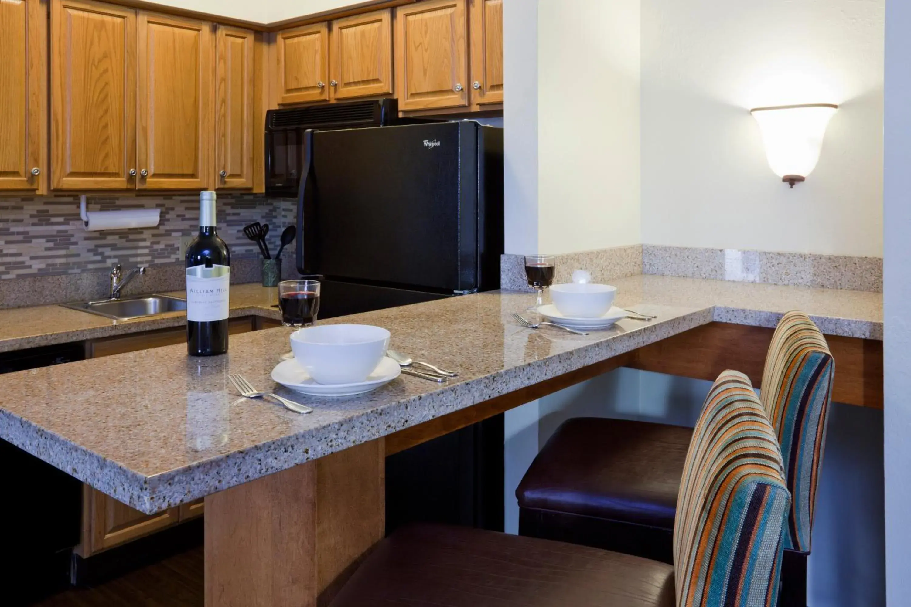 Bedroom, Kitchen/Kitchenette in Staybridge Suites Naples - Gulf Coast, an IHG Hotel