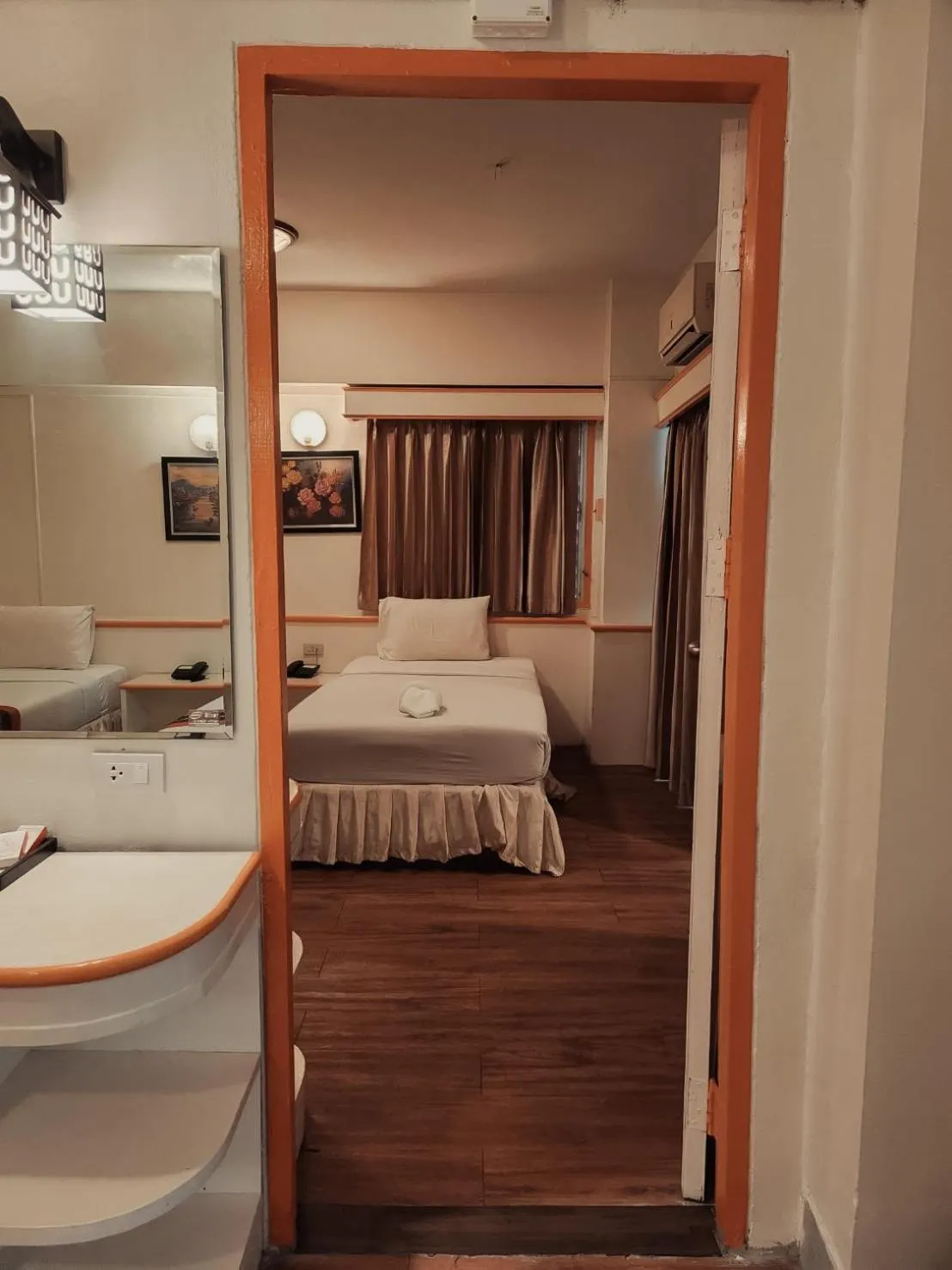 Bed in Asia Grand Hotel