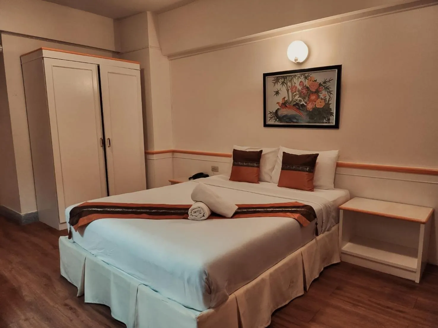 Bed in Asia Grand Hotel