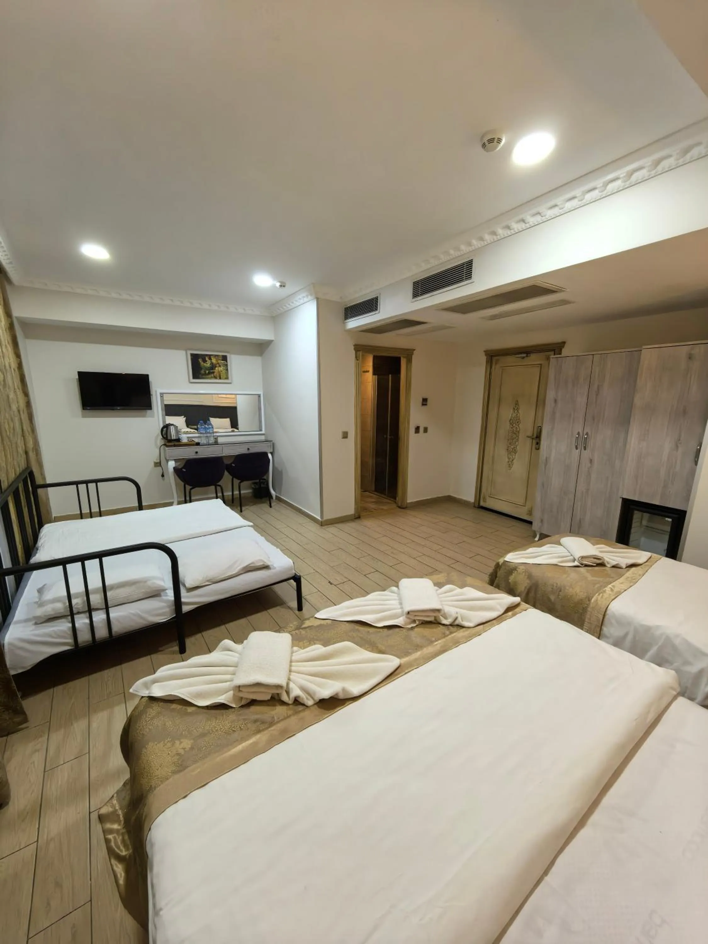 Bed in Apple Tree Hotel