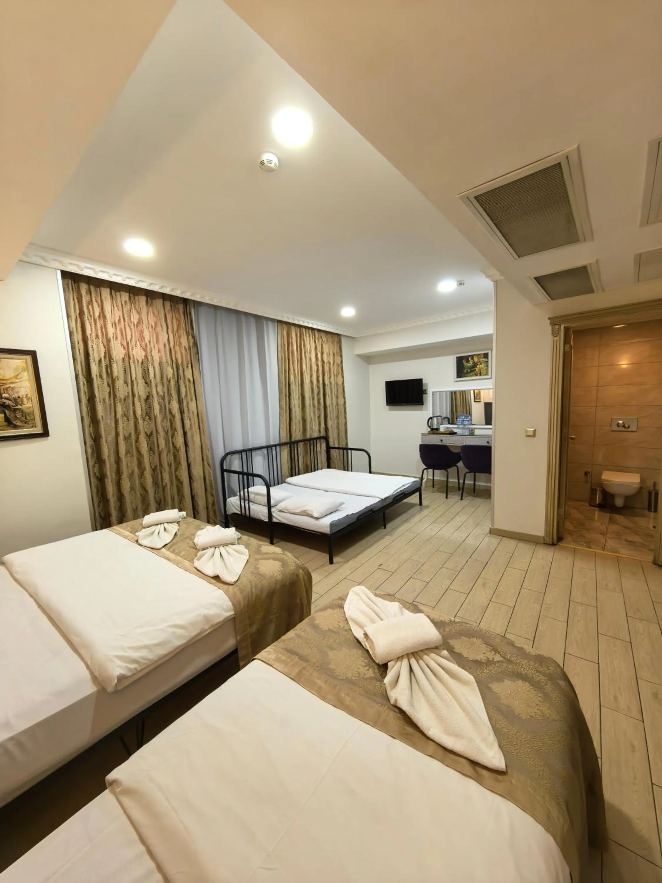 Bed in Apple Tree Hotel