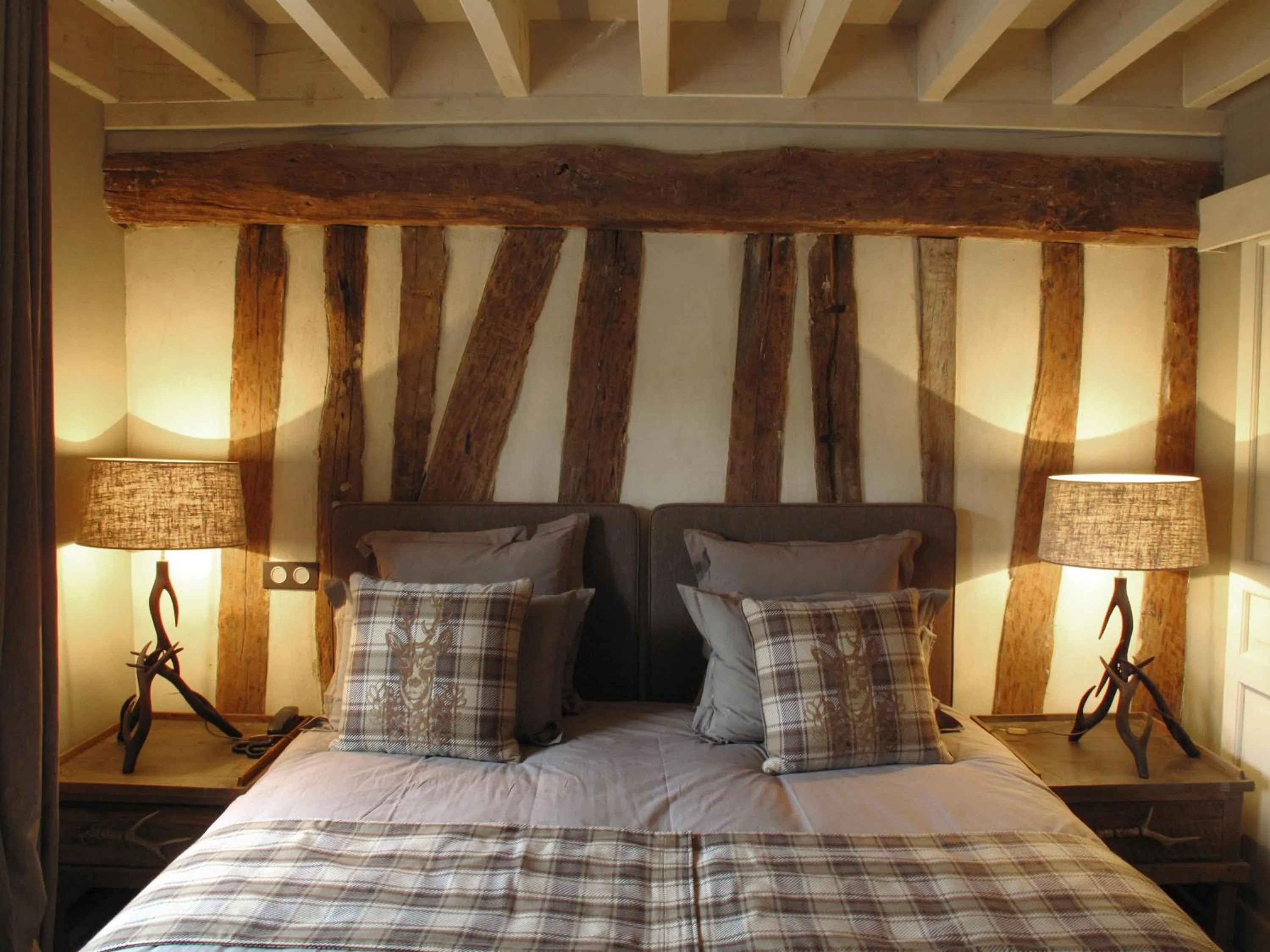 Bed in Hotel Du Grand Cerf & Spa