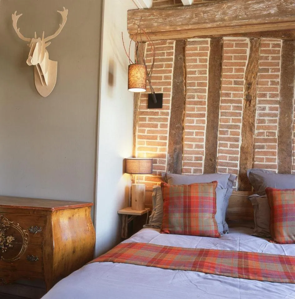 Bed in Hotel Du Grand Cerf & Spa