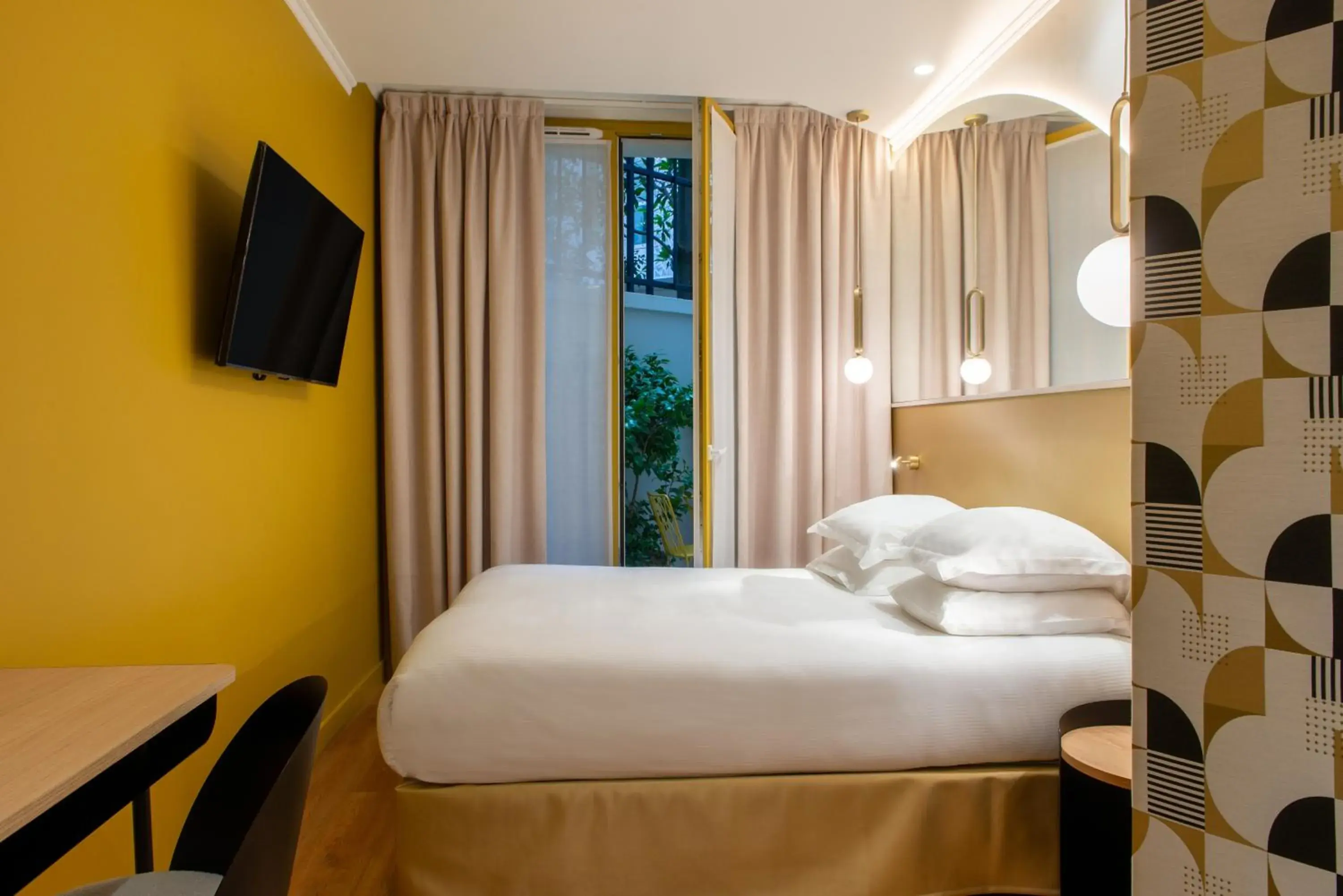 View (from property/room), Bed in Arc Elysées View (from property/room), Bed in Arc Elysées