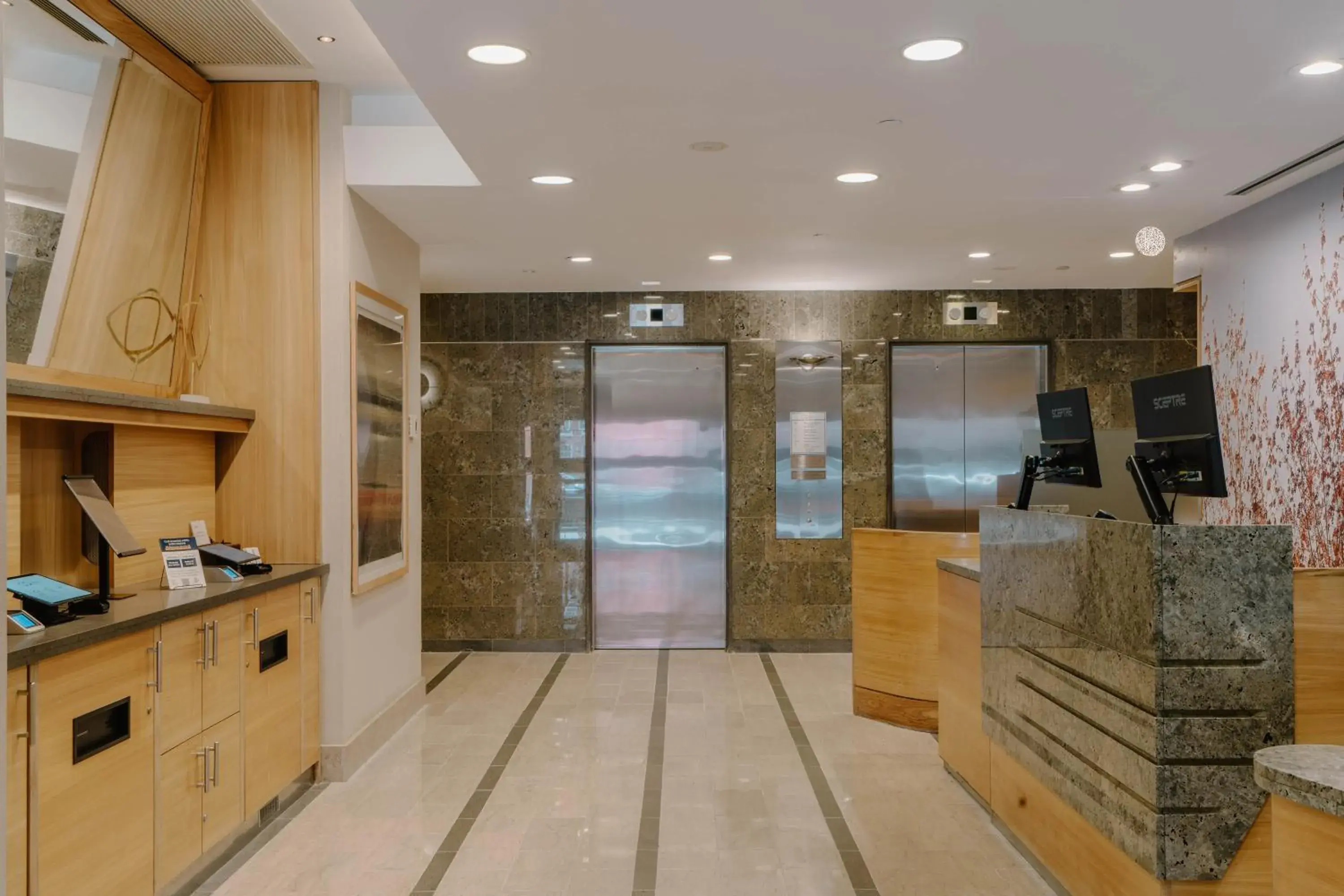 Lobby or reception in Club Quarters Hotel World Trade Center, New York Lobby or reception in Club Quarters Hotel World Trade Center, New York