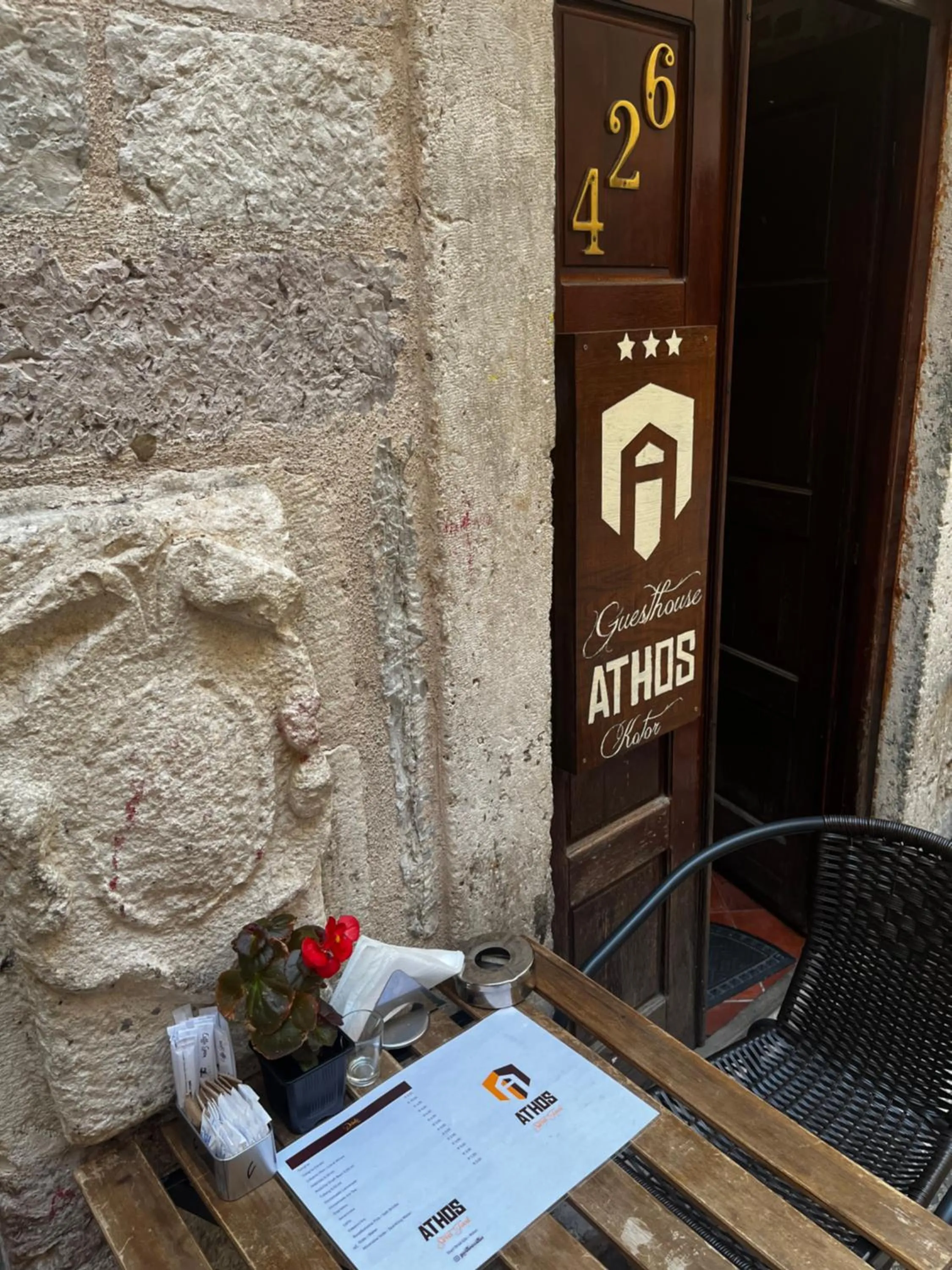 Property logo or sign in Athos Guesthouse