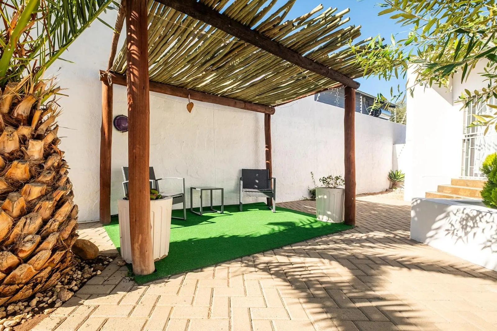 Garden in Kate's Nest Guesthouse & Backpackers