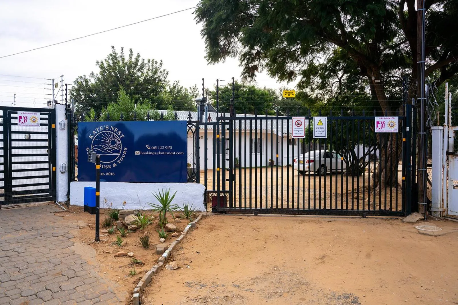 Property logo or sign in Kate's Nest Guesthouse & Backpackers