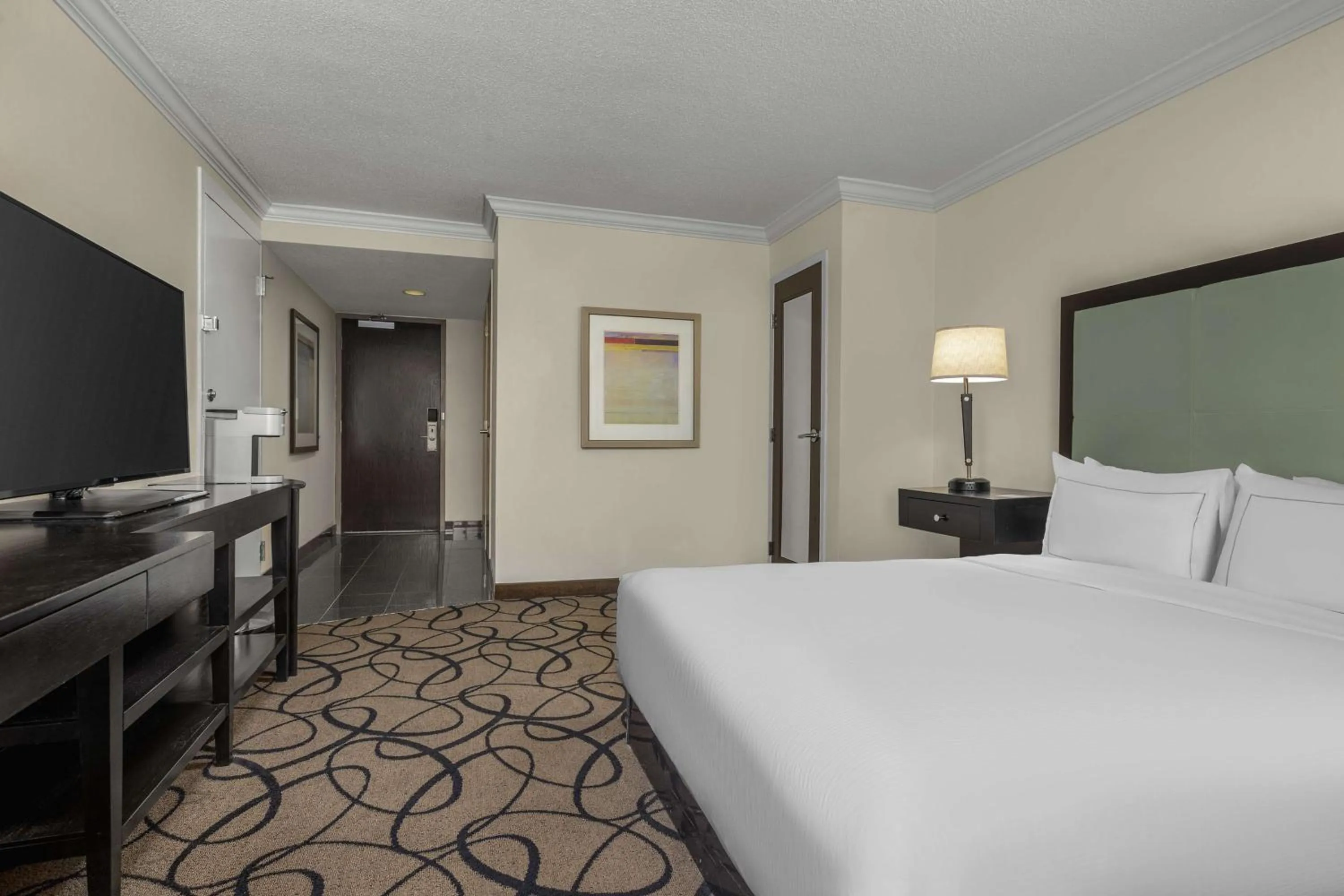 Bed in The Verve Boston Natick, Tapestry Collection by Hilton