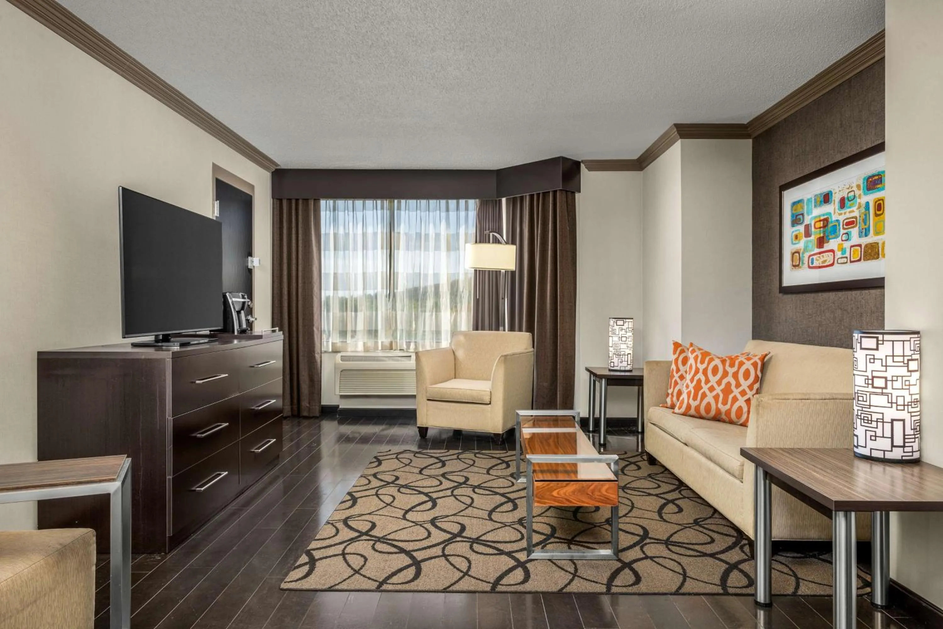 Living room in The Verve Boston Natick, Tapestry Collection by Hilton