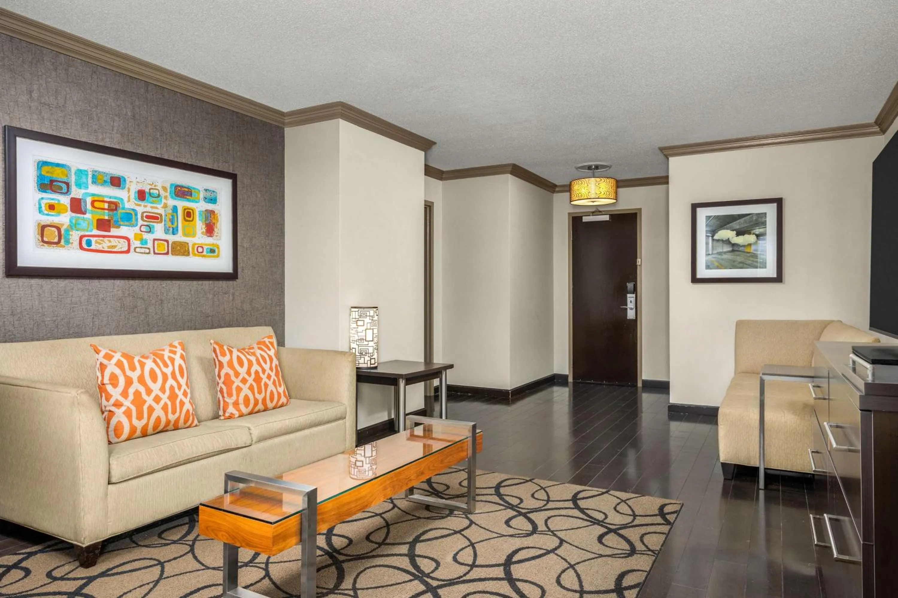 Living room in The Verve Boston Natick, Tapestry Collection by Hilton