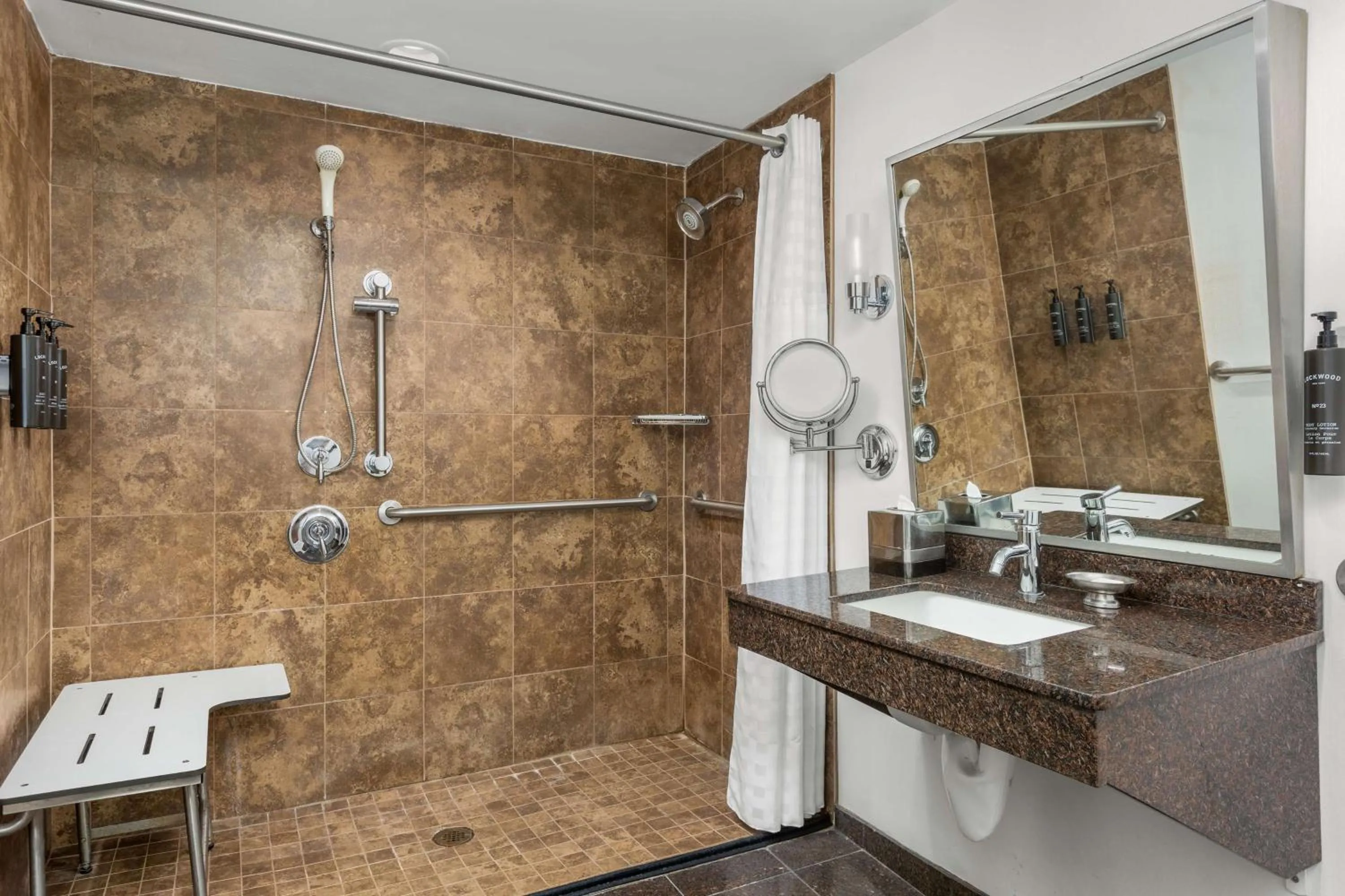Shower in The Verve Boston Natick, Tapestry Collection by Hilton