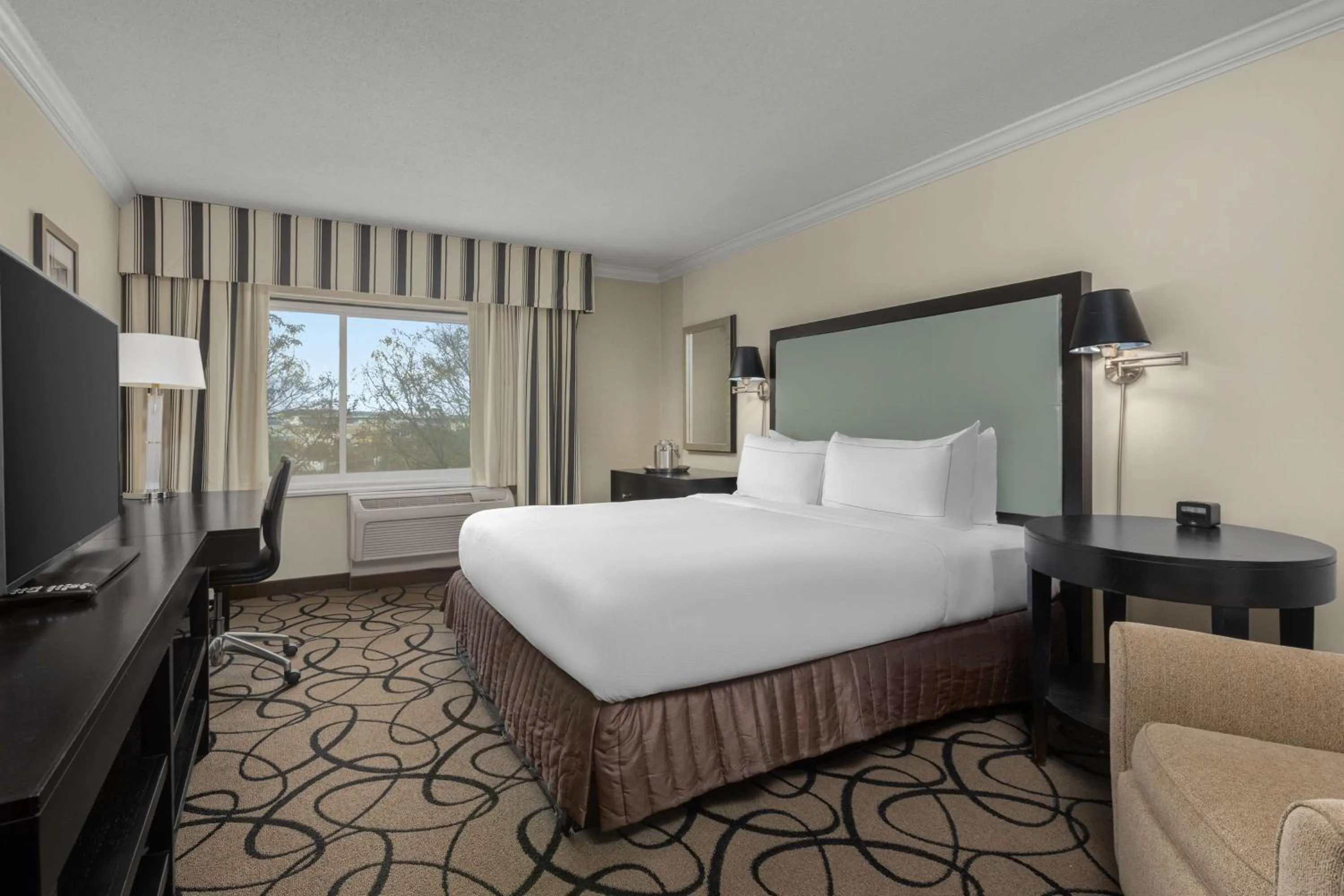 Bed in The Verve Boston Natick, Tapestry Collection by Hilton