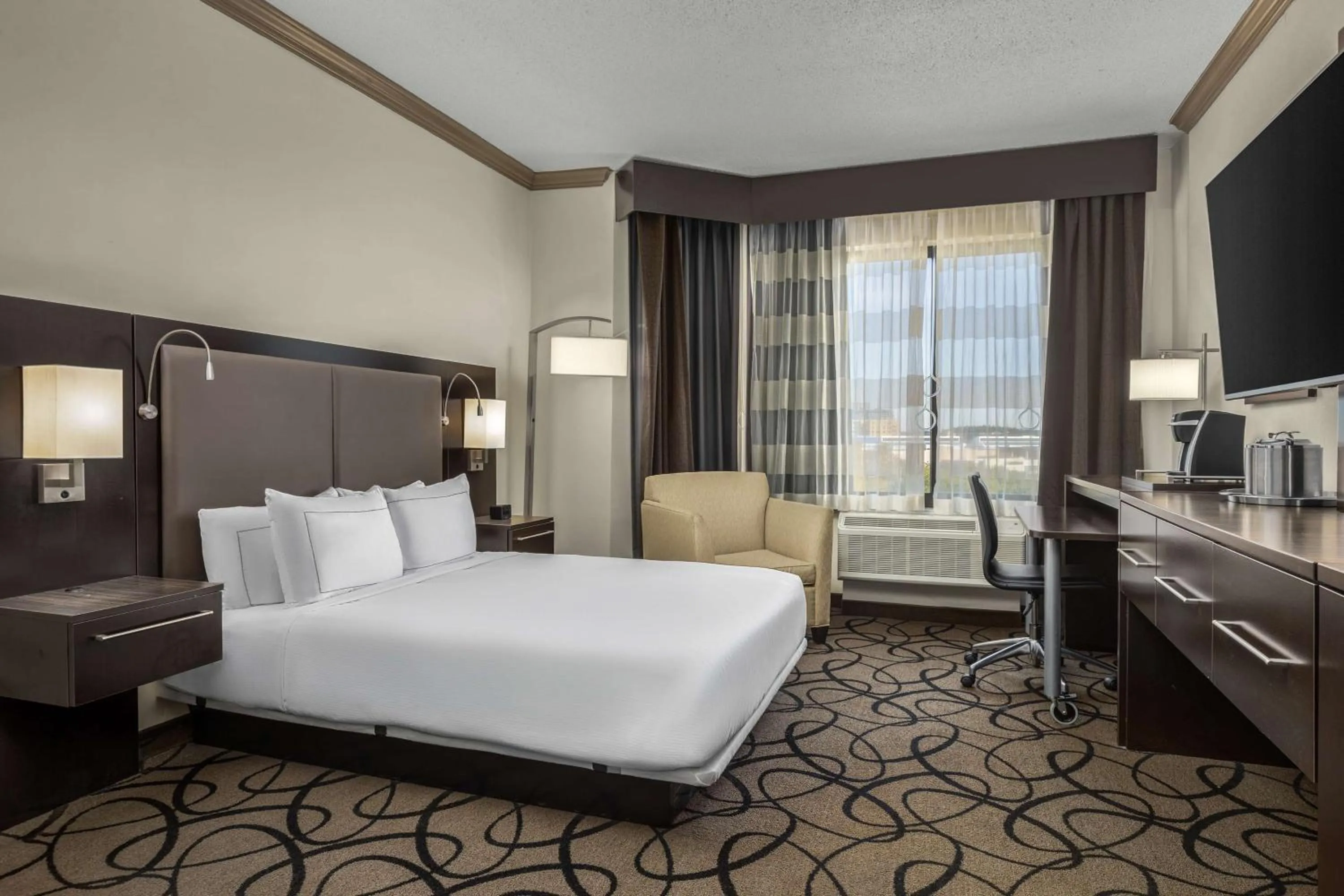 Bed in The Verve Boston Natick, Tapestry Collection by Hilton