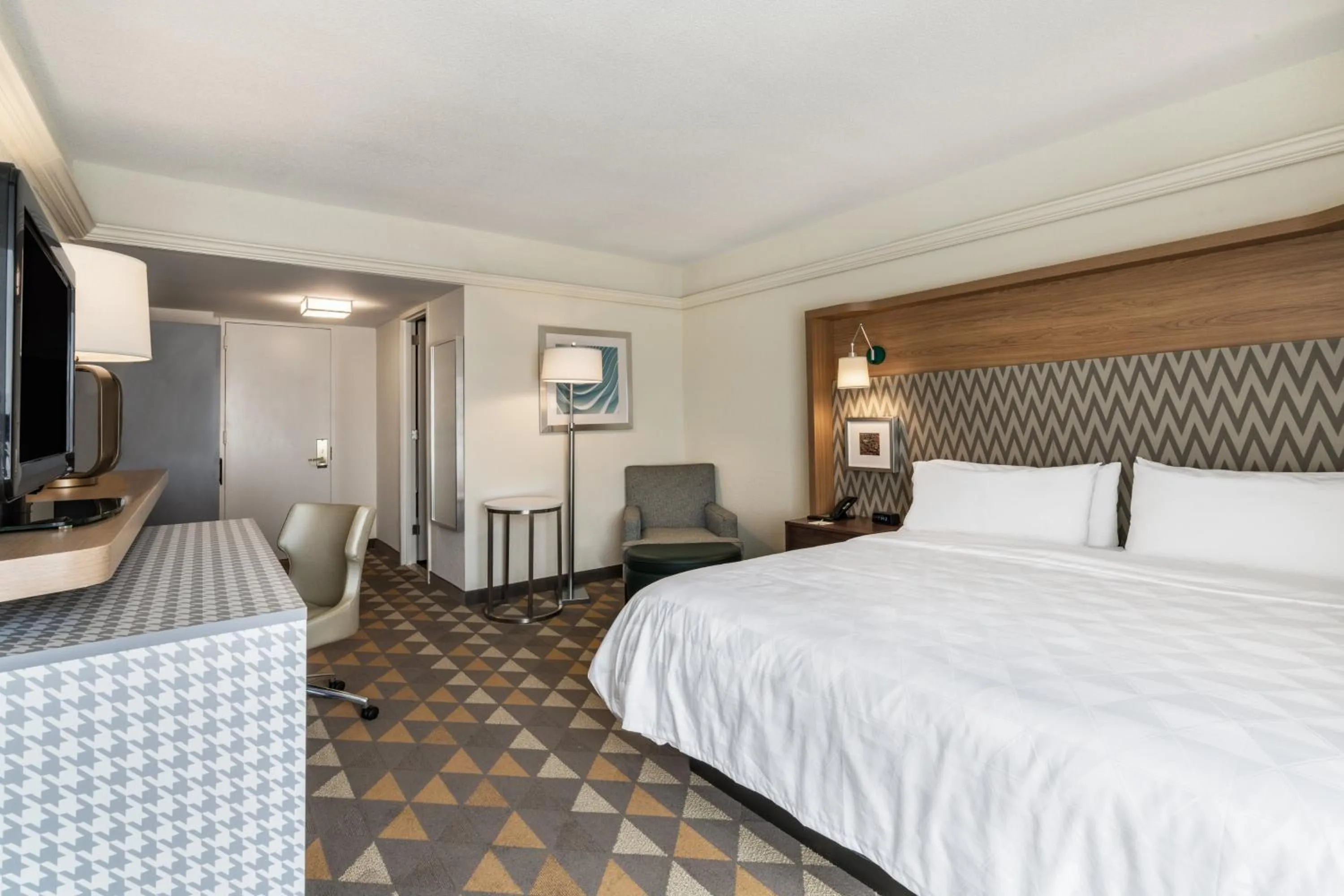 Photo of the whole room, Bed in Holiday Inn & Suites Pittsfield-Berkshires by IHG