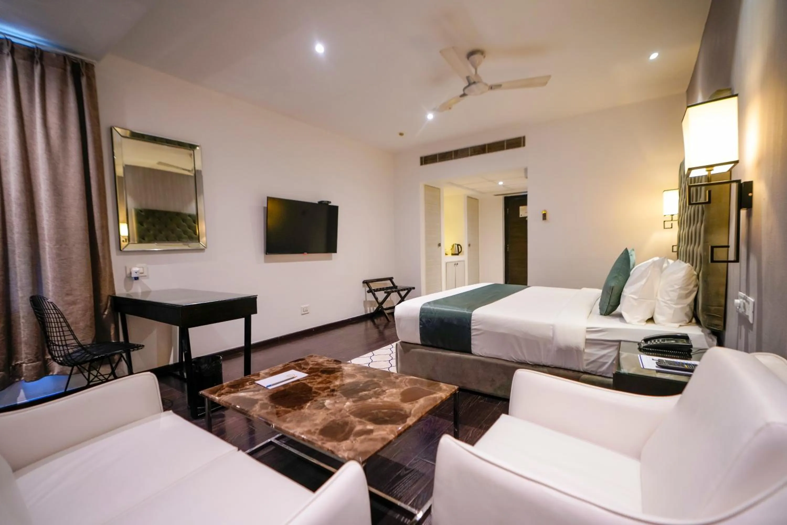 Photo of the whole room, Bed in Hotel Deccan Serai, HITEC CITY, HYDERABAD