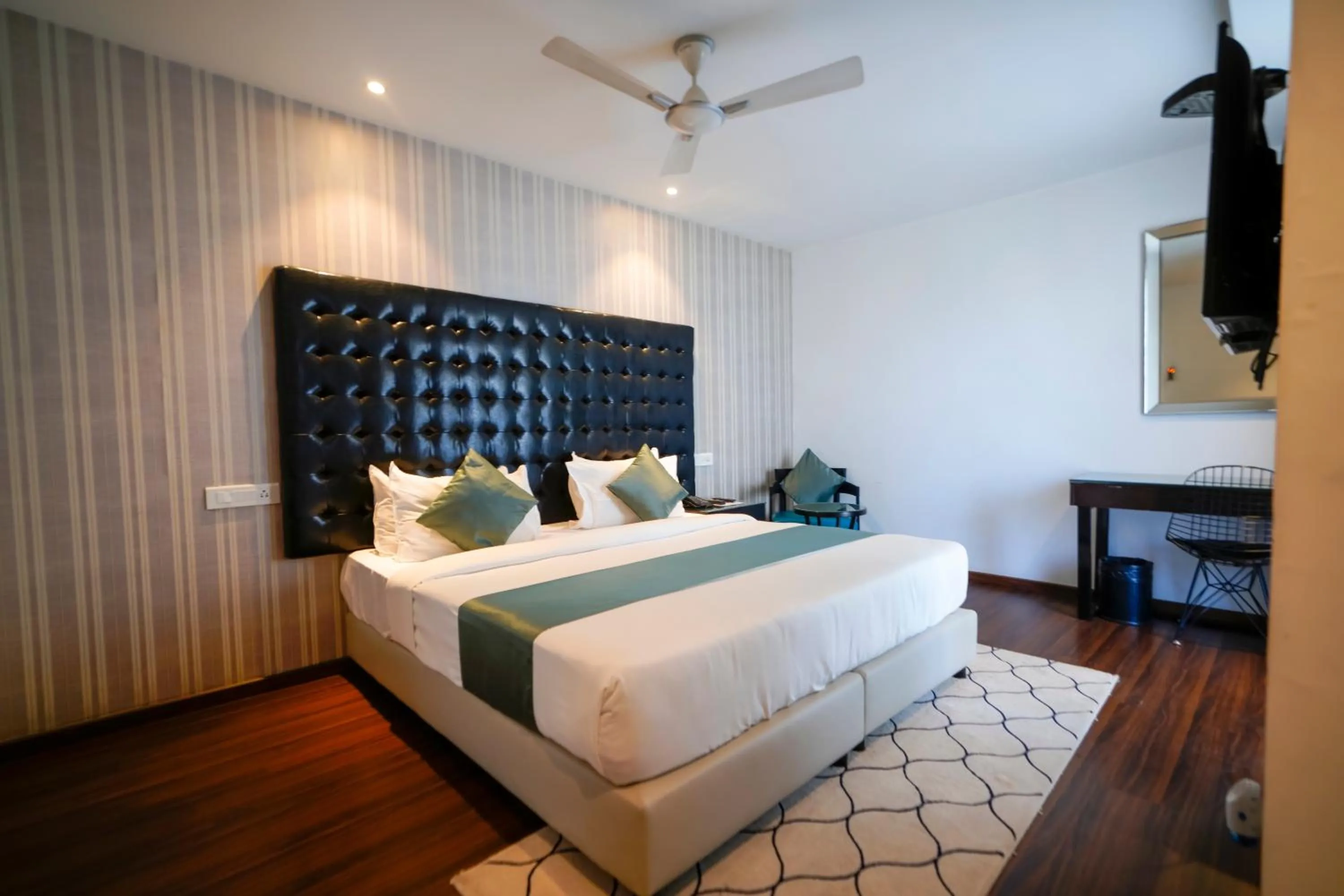 Photo of the whole room, Bed in Hotel Deccan Serai, HITEC CITY, HYDERABAD