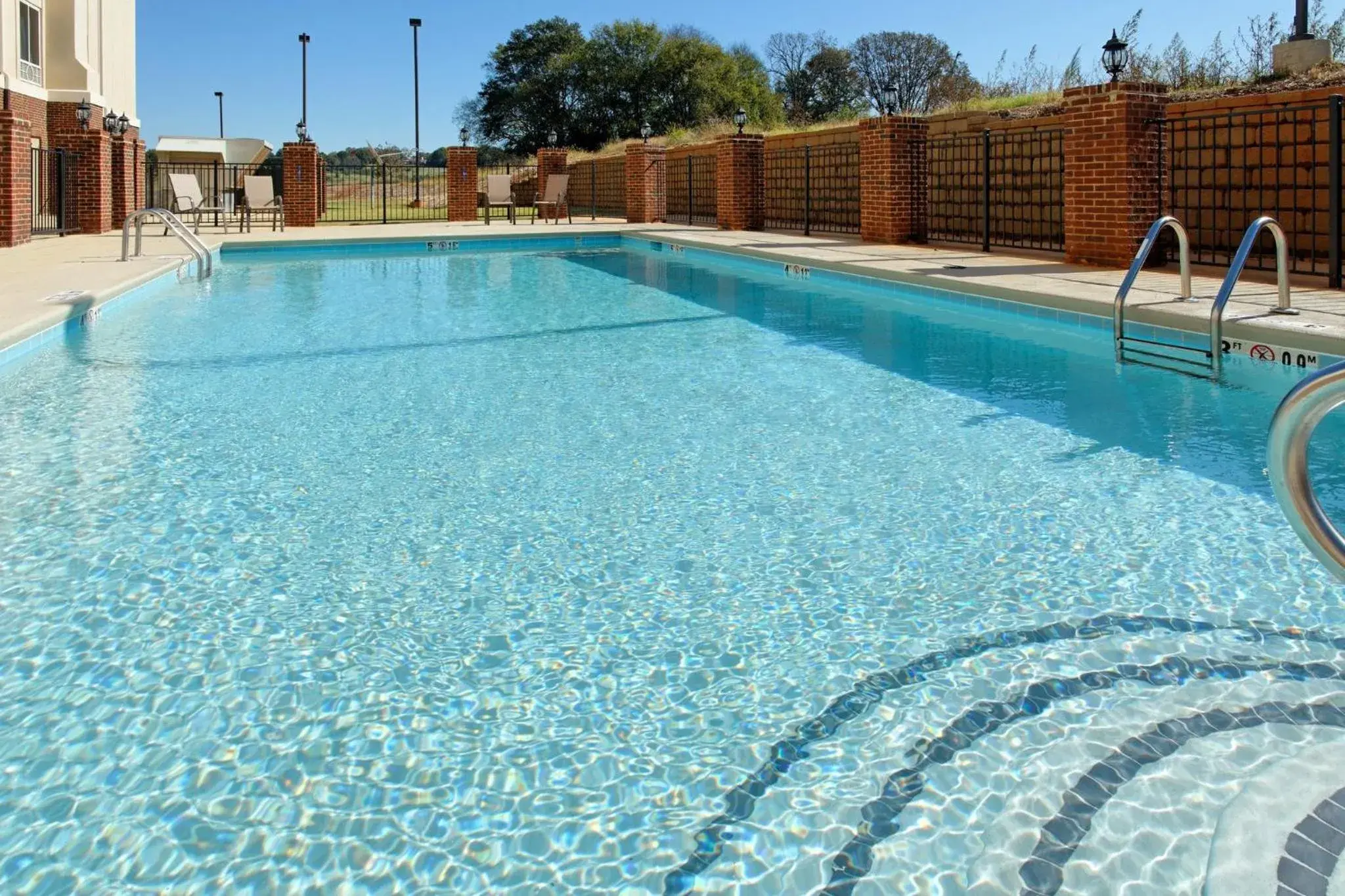 Swimming pool in Holiday Inn Express Hotel & Suites Talladega by IHG Swimming pool in Holiday Inn Express Hotel & Suites Talladega by IHG