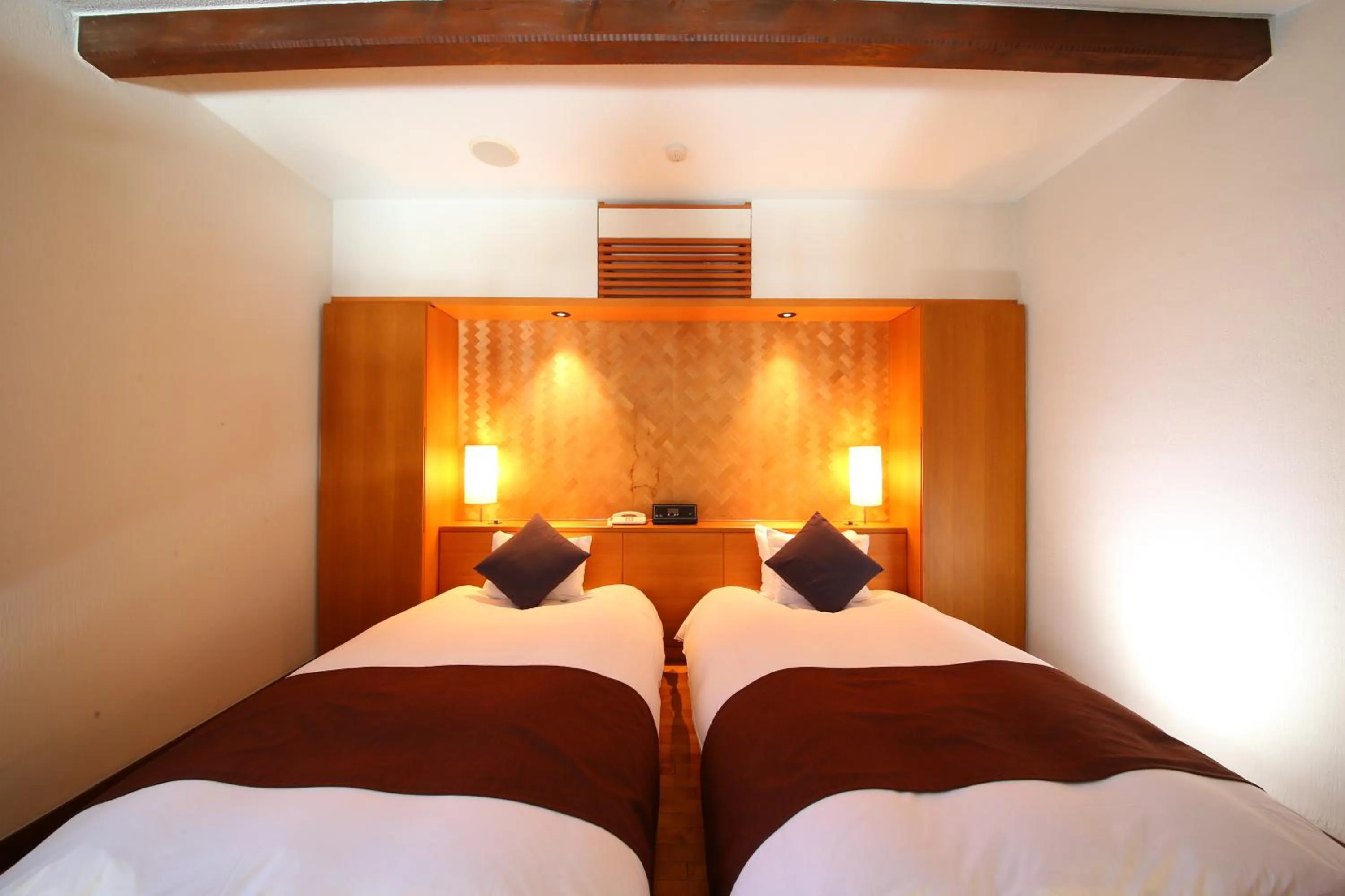 Bed in Tateshina Tokyu Hotel