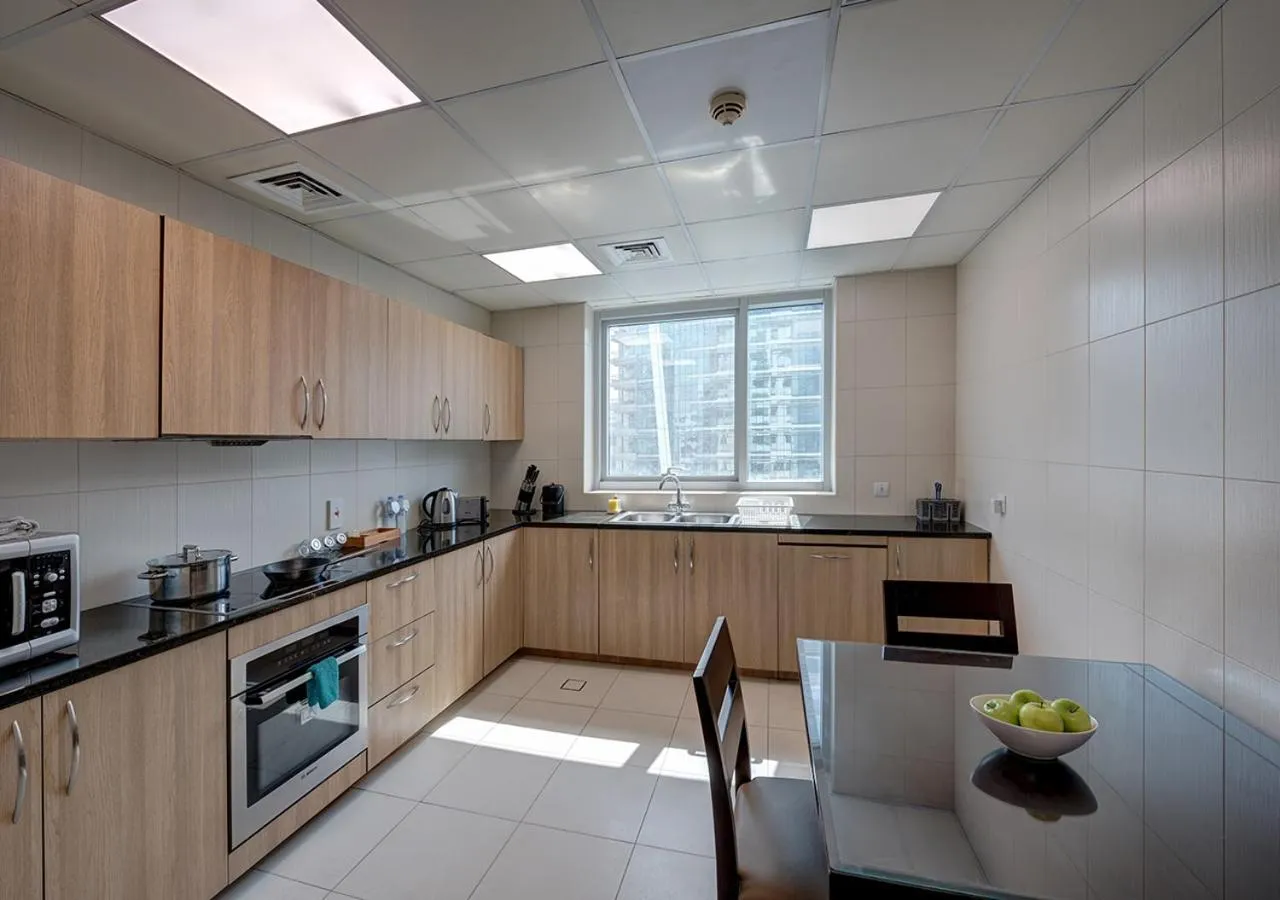 Kitchen or kitchenette in Marina Hotel Apartments