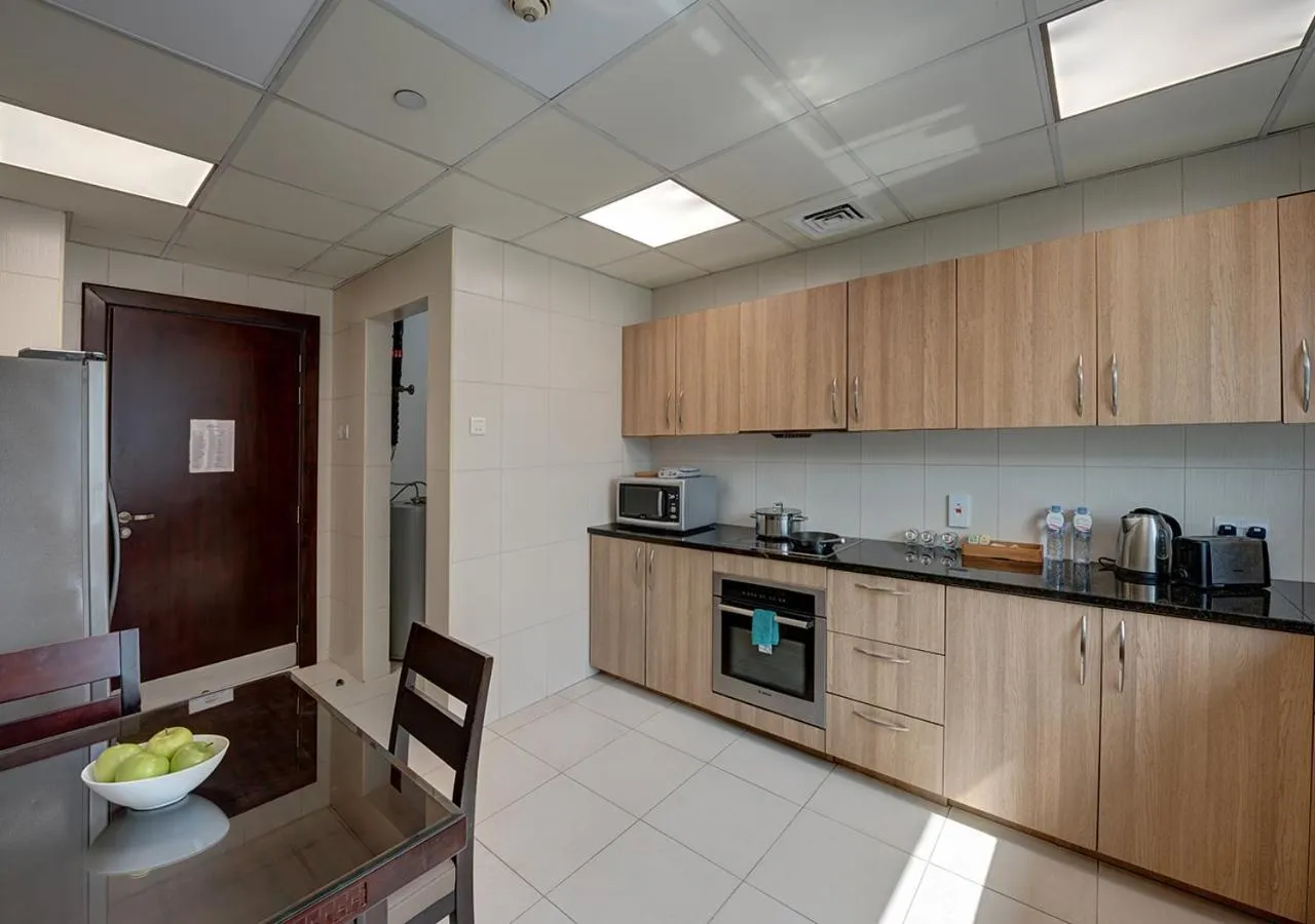 Kitchen or kitchenette in Marina Hotel Apartments