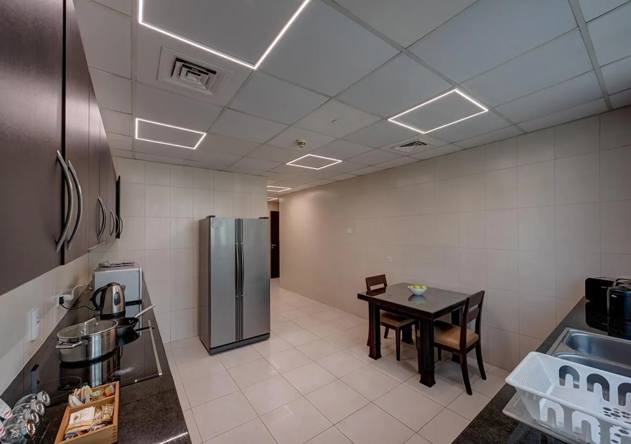 Kitchen or kitchenette in Marina Hotel Apartments
