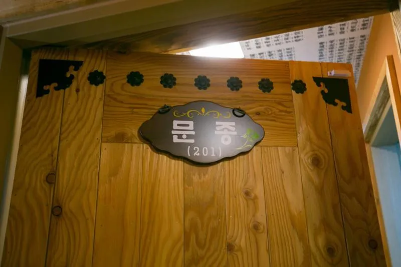 Property logo or sign in Ddlanche Guesthouse New Building