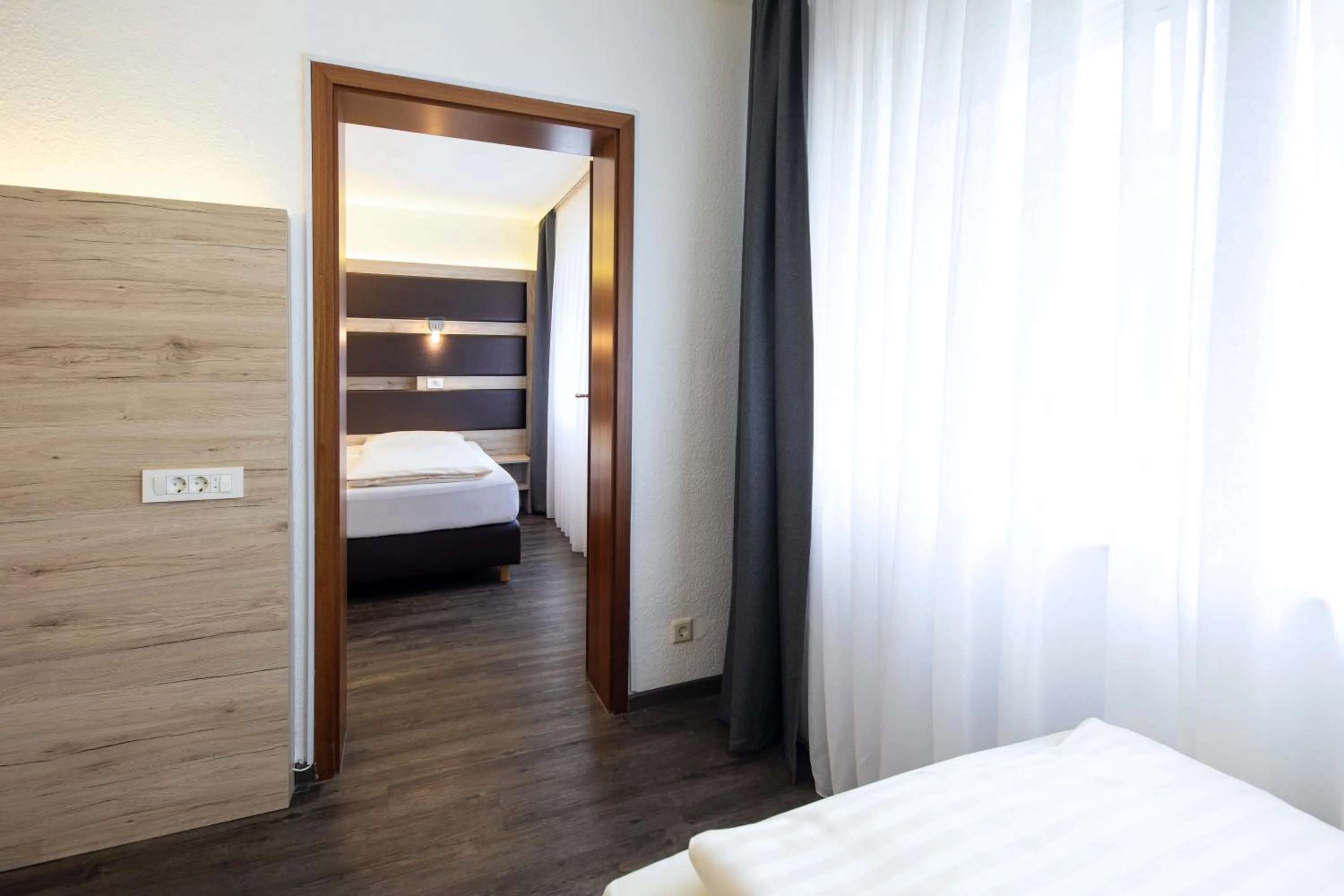 Bedroom, Bed in Roomingtons Lüneburger Heide