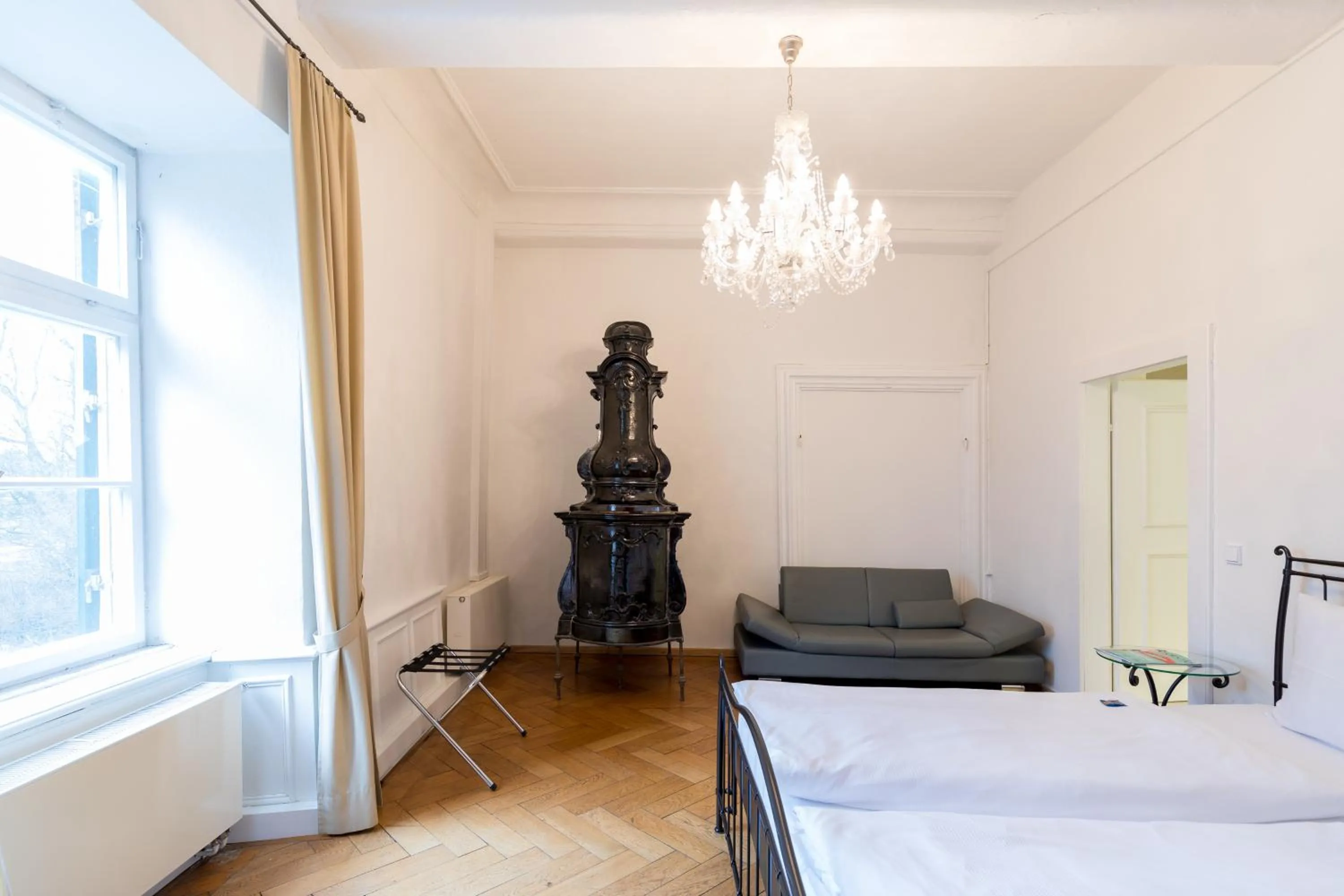 Photo of the whole room, Bed in Schlossparkhotel Mariakirchen