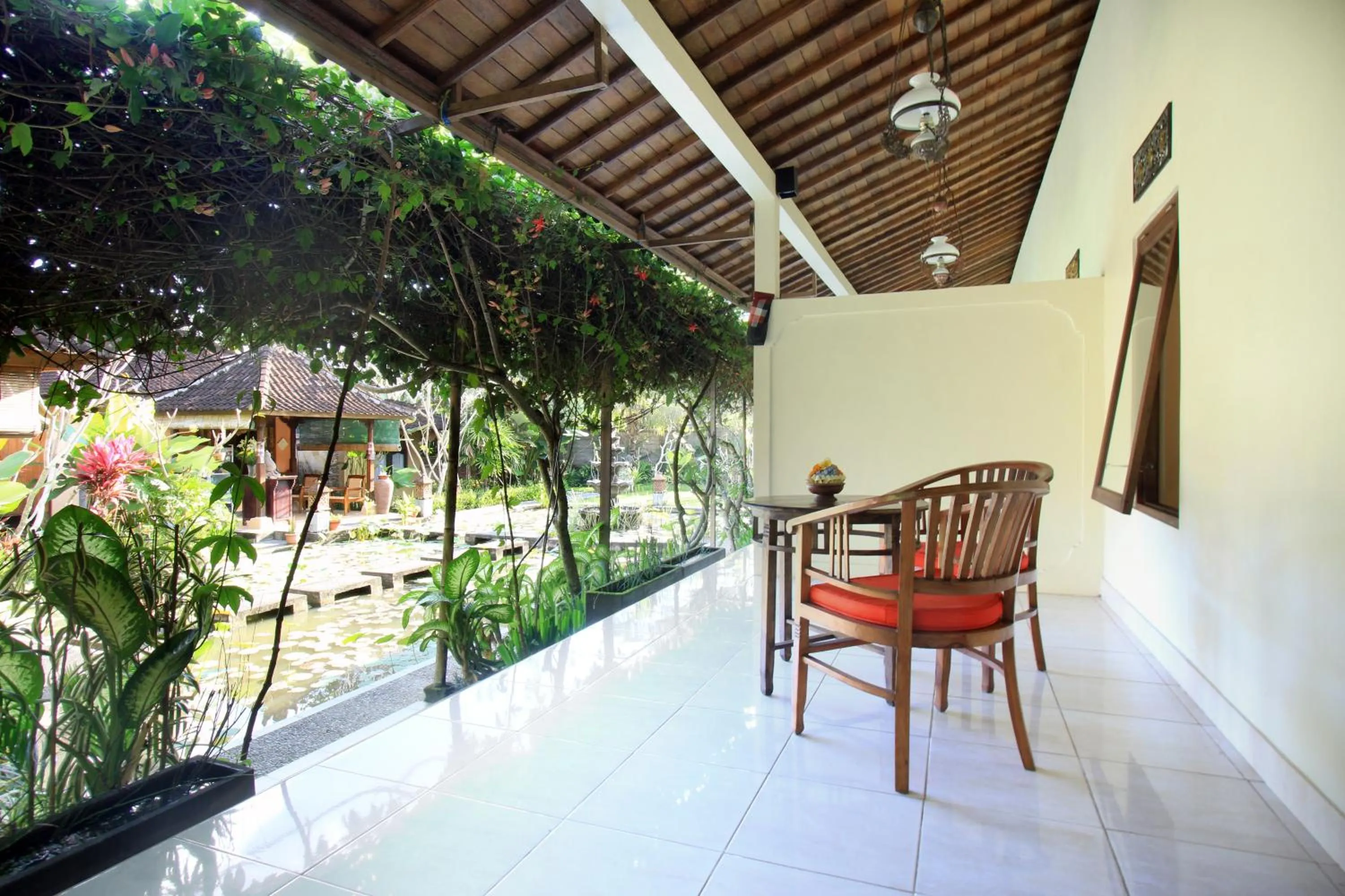 Balcony/Terrace in Nara Ubud Cottage by Mahaputra