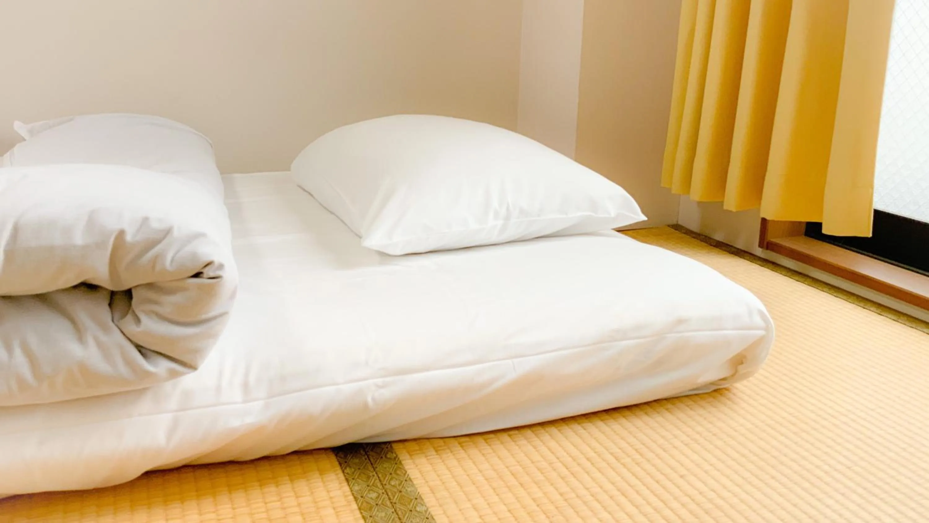 Bed in Guesthouse Kyoto Abiya