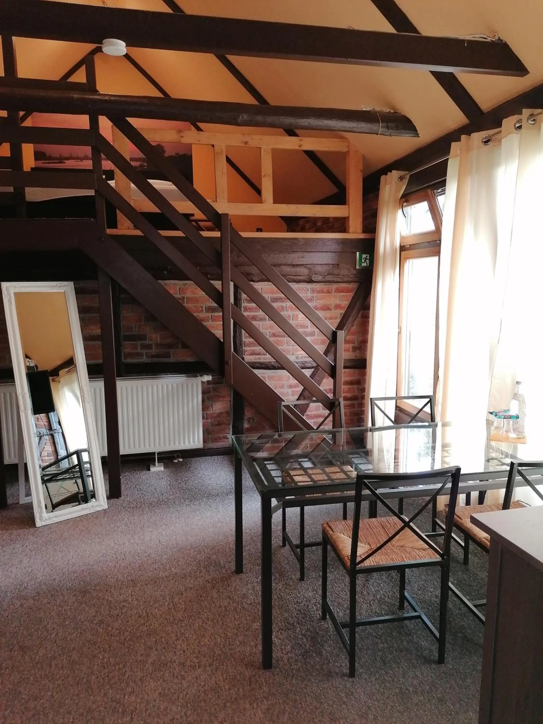 Seating area in Pension Riverside in Leverkusen Hitdorf am Rhein - Zentral an der A1 und 59