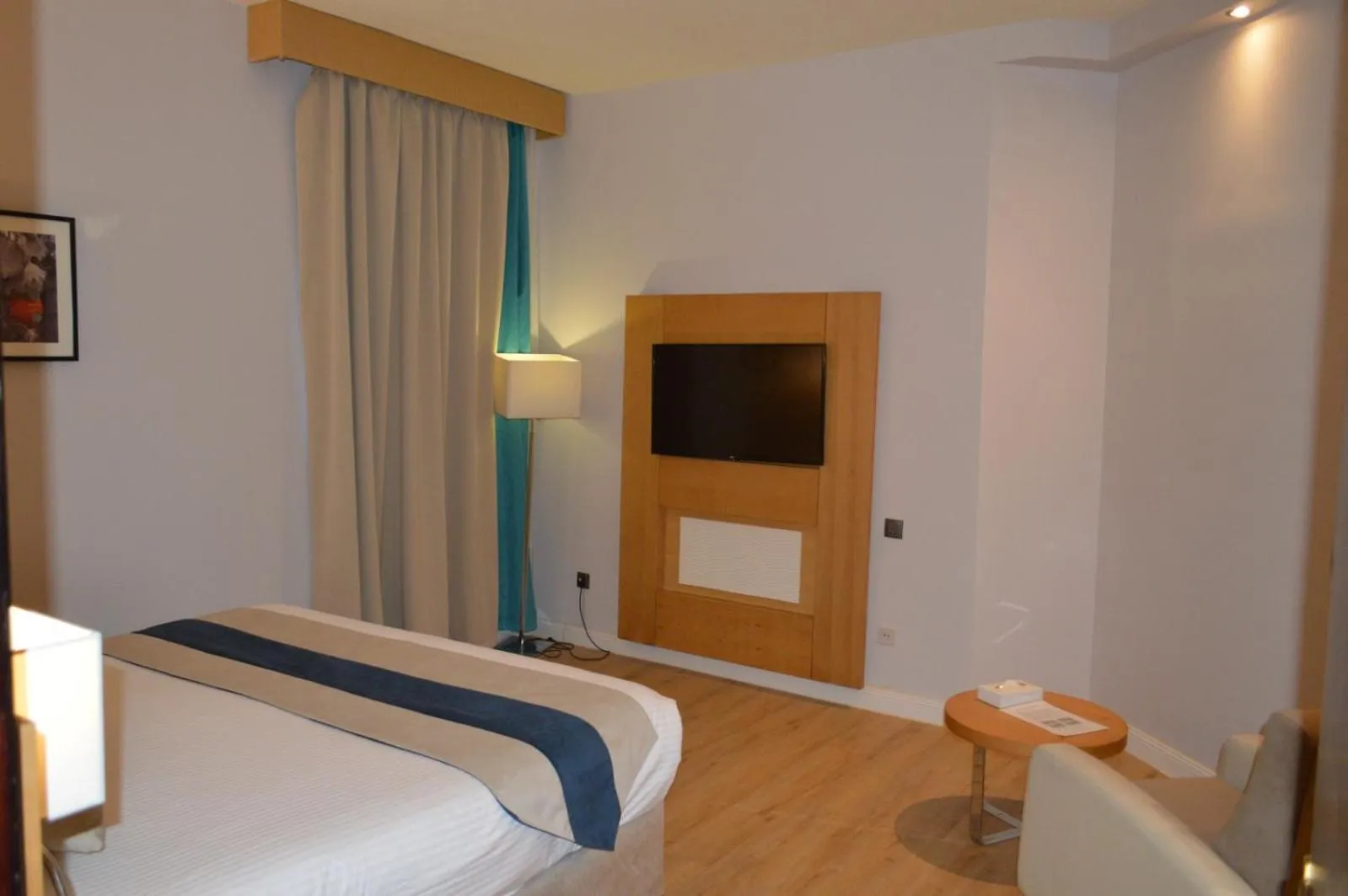 Bed in Golden Tulip Hail