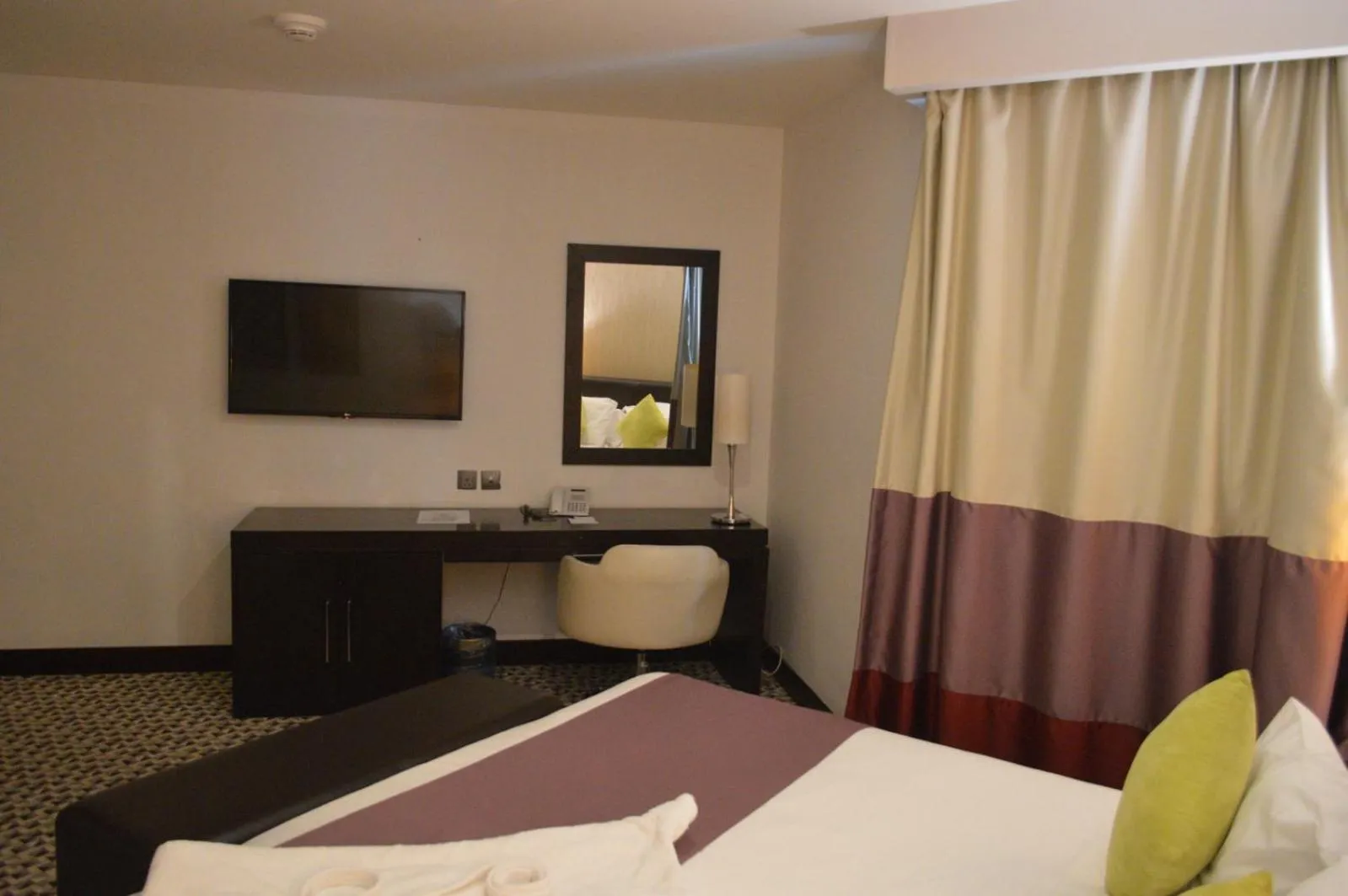 Bed in Golden Tulip Hail