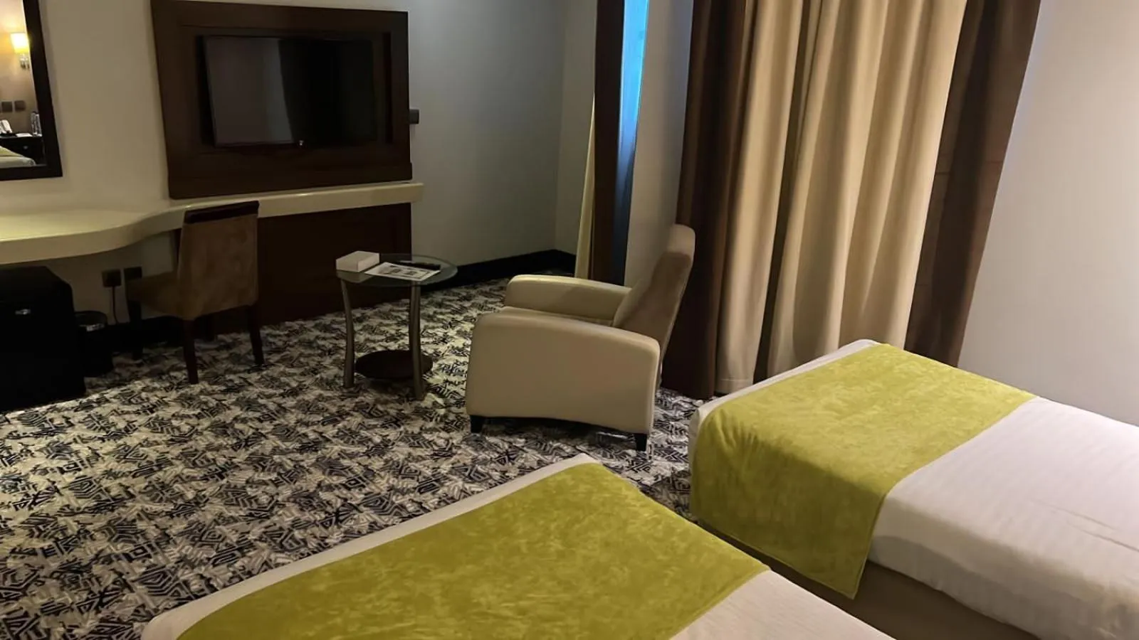 Bed in Golden Tulip Hail