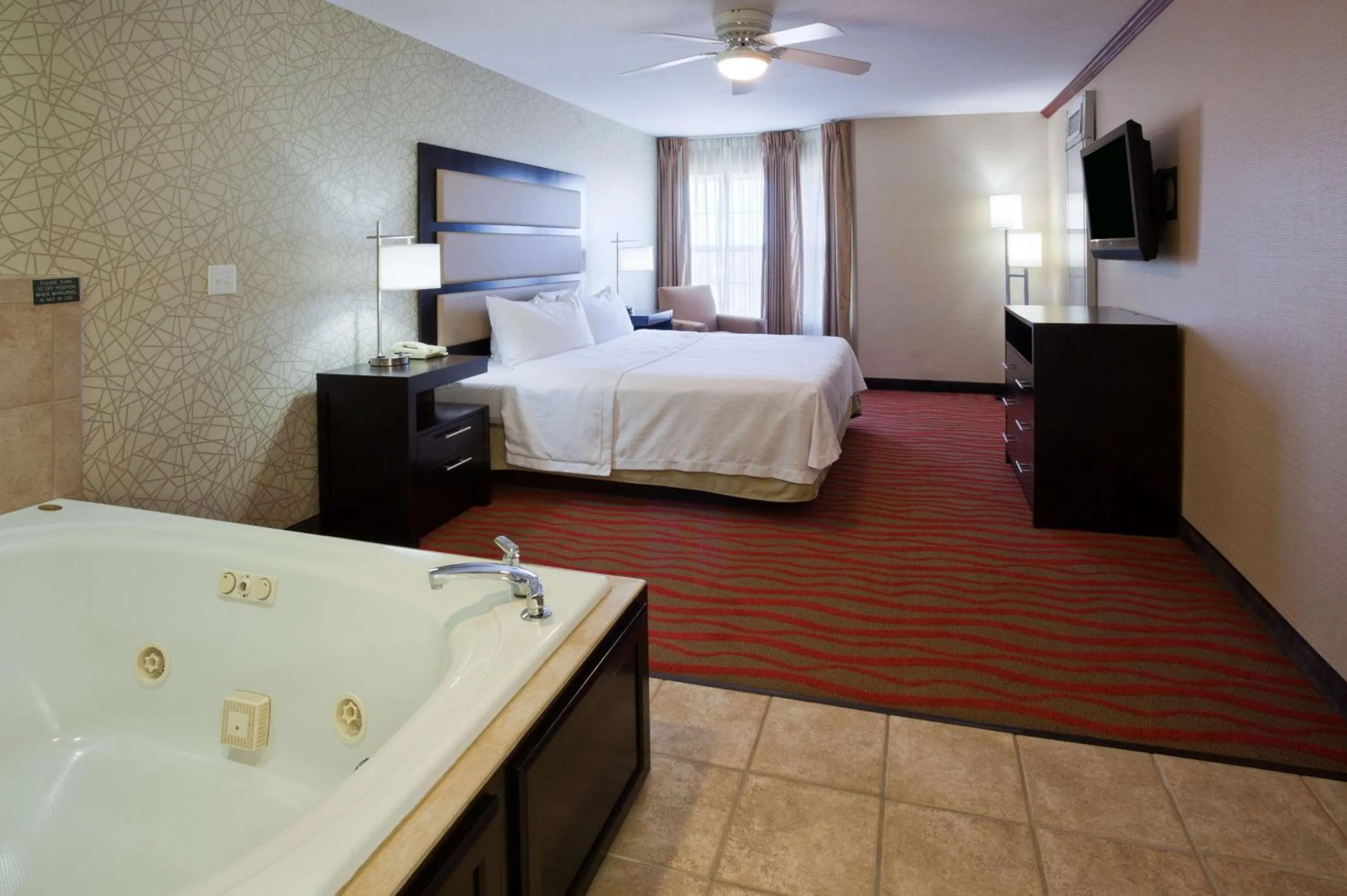 Bed in Homewood Suites by Hilton Sioux Falls