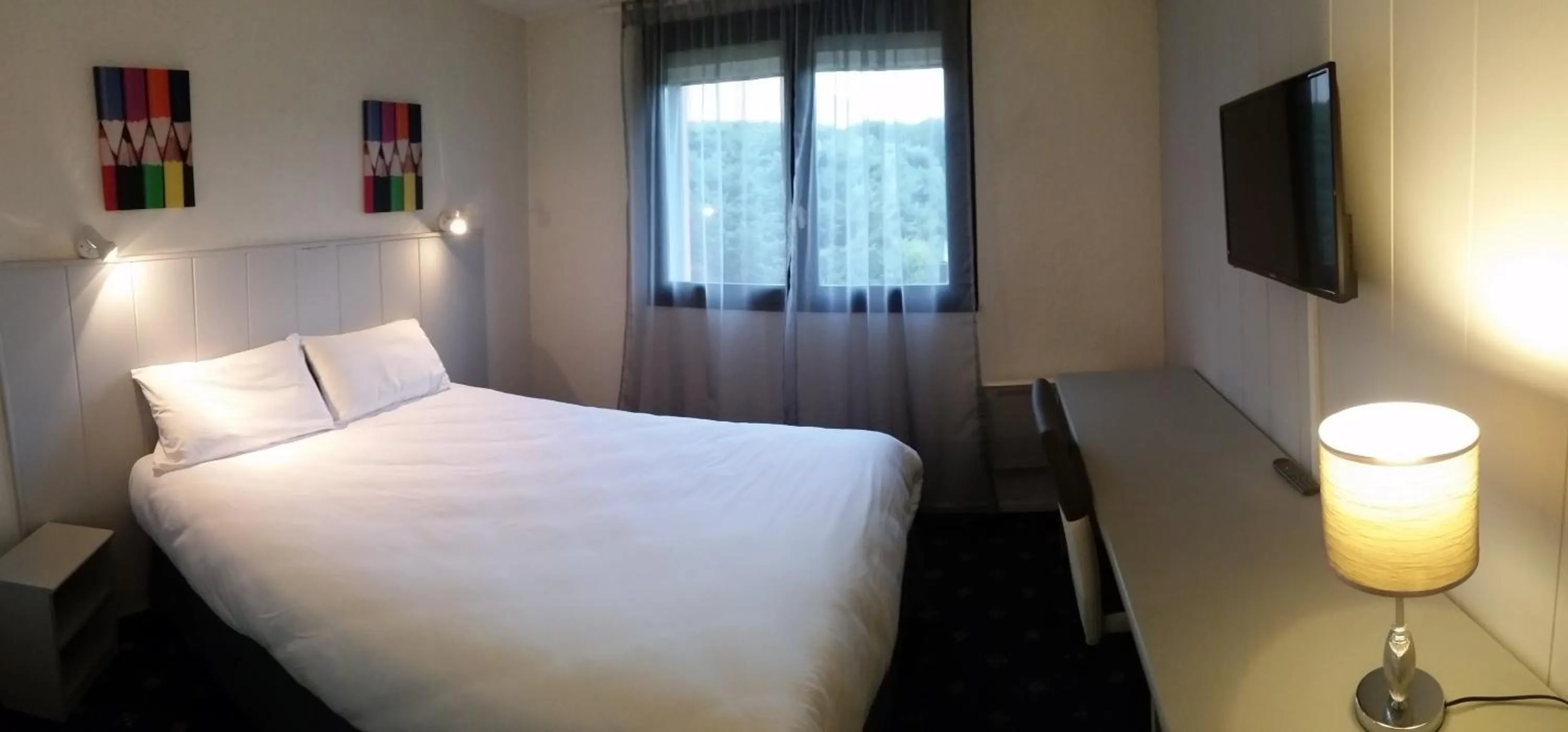 Bed in Hôtel Le Forestia